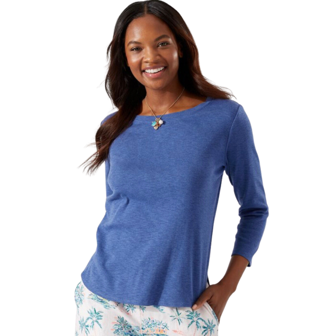 Pearls Boutique Port Dover Ontario - Ashby Isles 3/4 Sleeve Tee - Colour -Blue. Experience the delightful sensation of our soft, micro-rib cotton against your skin, enhanced by its relaxed slubbed texture. The shirt's hem with a stylish tail and ¾-length sleeves further contribute to its laid-back charm. Made entirely of cotton, it is easy to care for—simply machine wash on a gentle cycle and tumble dry on a low setting. Avoid dry cleaning for optimal maintenance.