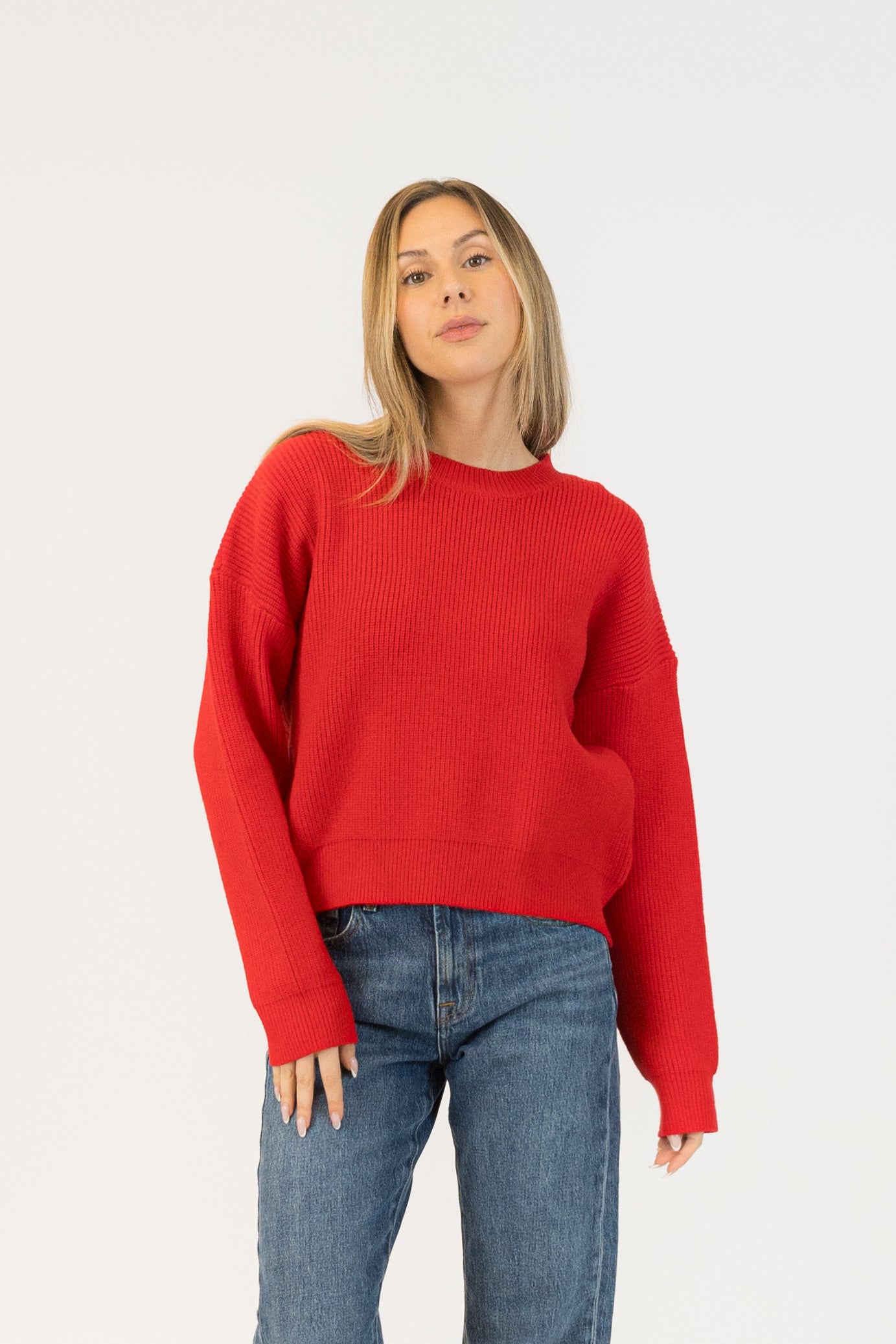 Pearls Boutique| Port Dover Ontario|Lyla + Lux | Avery Crewneck Sweater|Lyla + Lux women’s heavyweight ribbed crewneck sweater, soft, structured blend of viscose, polyester, and polyamide, classic crew neckline, long sleeves, and an all-over ribbed texture that adds depth and sophistication. Relaxed fit, dropped shoulder. Colour Red.