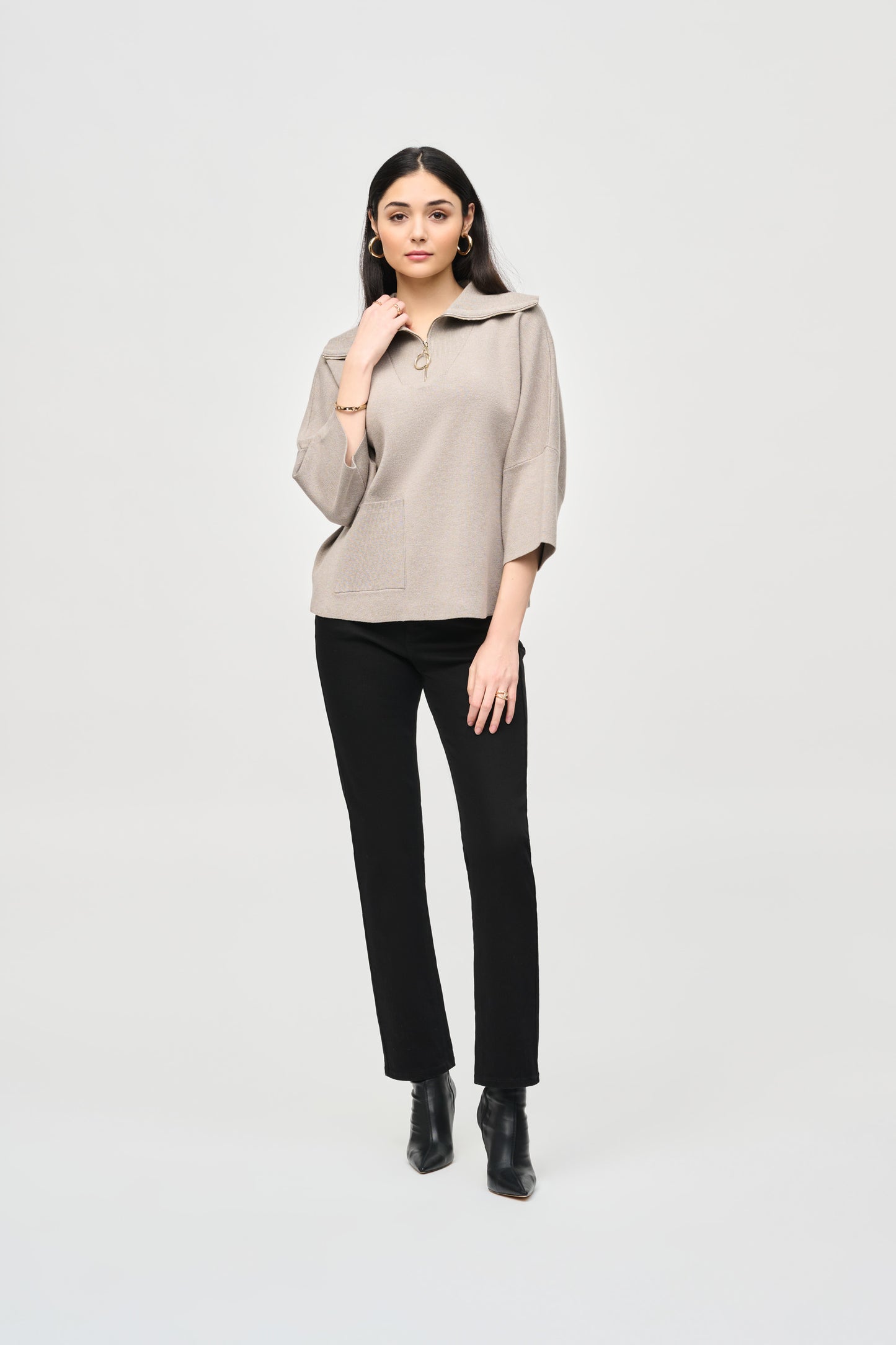 Pearls Boutique - Port Dover Ontario - Joseph Ribkoff - Jacquard Zipped Collar Sweater 243954. Off Taupe Colour. Designer: Joseph Ribkoff Style: Casual chic top Neckline: Cutaway Fit: Oversized Length: Short Sleeves: 3/4 dolman Design: Plain with cool zipper element Occasion: Daily wear Material: 50% Viscose Rayon 30% Polyester 20% Nylon