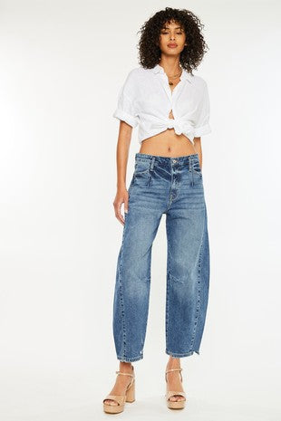 Pearls Boutique-Port Dover Ontario-Low-slung horseshoe fit jeans, dark wash, comfort stretch, zipper fly, belt loops shifted down, faux welt pockets, light orchid tint

Oversized fit with barrel leg and tapered bottom

Rise 12"&nbsp;

Inseam 17"

84% Cotton, 15% Lyocell, 1% Spandex

11.5 OZ