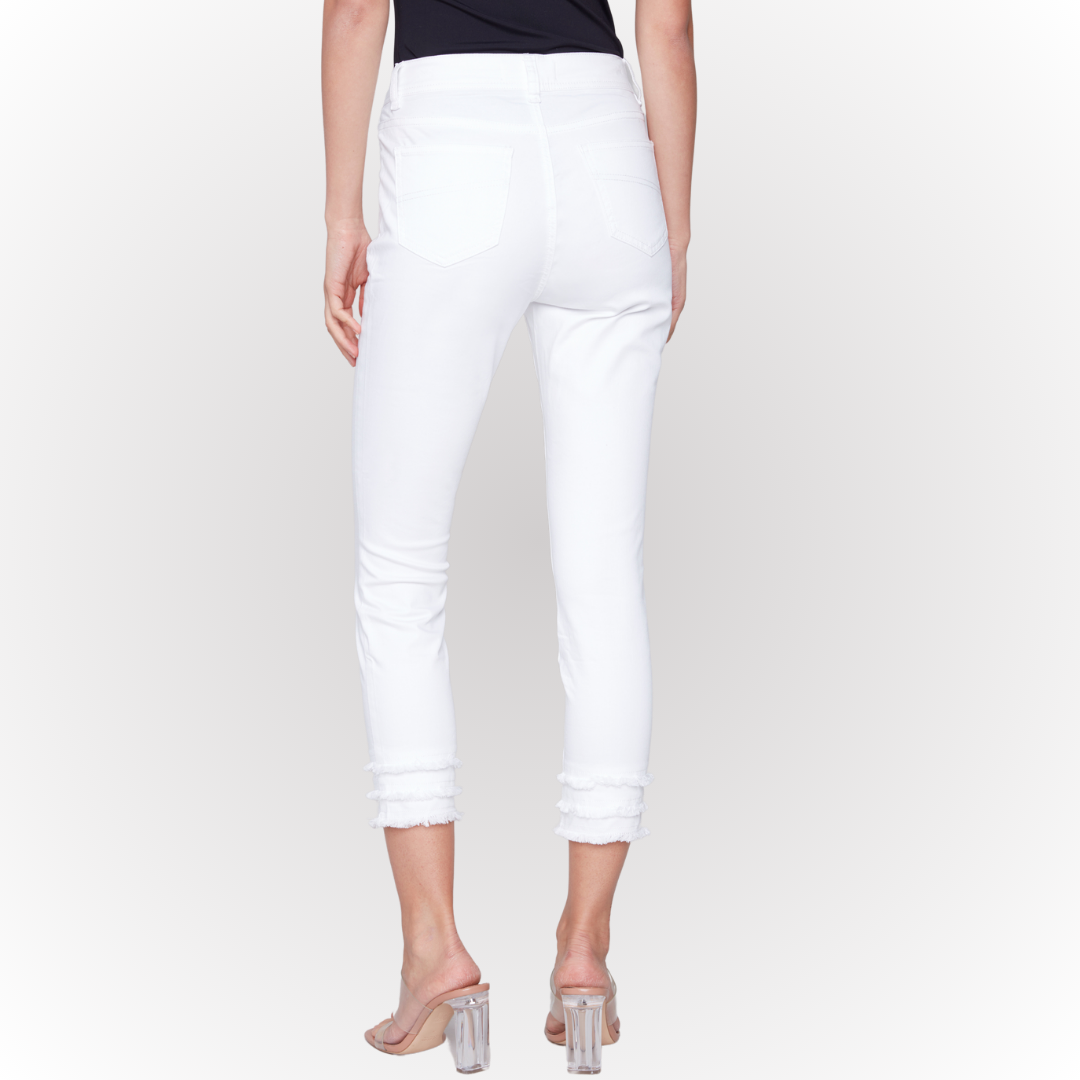 Pearls Boutique - Port Dover Ontario - The Charlie B Fringe detail crop is a white 5 pocket, Fly Front, high rise jeans cropped in length with a fun double fringe detail at the hem. Perfect to pair with you fav flip flops or heels.