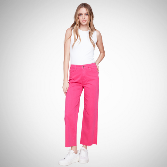 Pearls Boutique - Port Dover Ontario - Charlie B - Five Pocket Cropped Flare. The Charlie B - Five Pocket Flare Leg Pant. Is a gorgeous soft stretch denim. available in a classic white or a punchy pink. High rise, wide leg, slim at hips, slight flare, cropped, raw edge hemline. Pink 