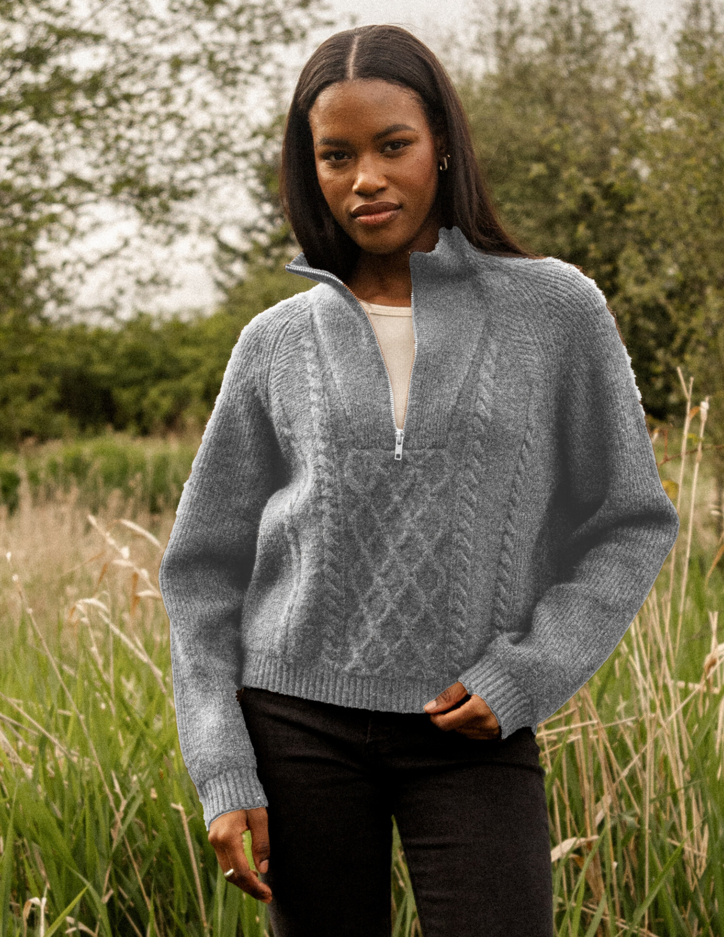 Pearls Boutique- Port Dover Ontario-Gentle Fawn-Georgie Pullover Sweater-GF2409-3057
Stay snuggly warm and stylish with the Georgie pullover, crafted from a plush grey heathered yarn for dimensional&nbsp; colour. This sweater boasts a front 3/4 zipper and intricate cable knit details, making it the perfect piece for a cozy and chic look. Don't miss out on adding this gorgeous knit to your wardrobe!