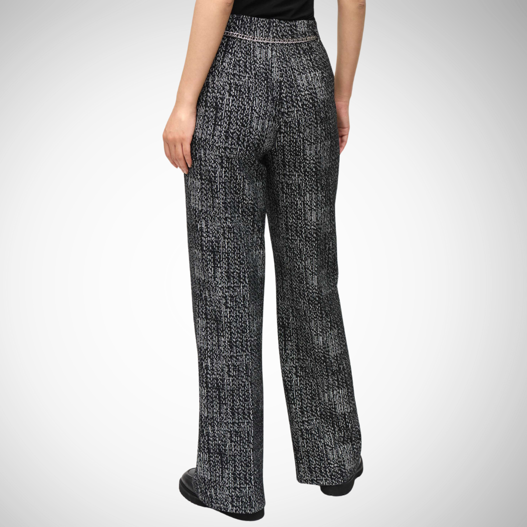 Pearls Boutique - Port Dover Ontario - Joseph Ribkoff - High Rise Abstract Pull On Pant . Black with grey abstract print. Elevate your wardrobe with Joseph Ribkoff Abstract Trousers High-rise, pull-on design Straight fit and full-length Abstract pattern merging business style with edgy flair Perfect for semi-formal events or special nights out Crafted from: 72% polyester, 24% cotton, 4% spandex No pockets or zipper for a sleek, streamlined look