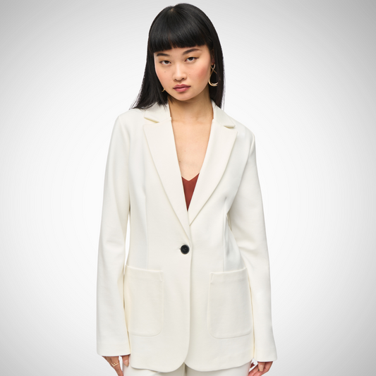 Pearls Boutique - Port Dover Ontario - Joseph Ribkoff -Ivory Blazer - style # 243054. Perfectly embodies modern chic Made to fit any mood or event Expertly tailored in weighted knit fabric Features a notched collar and fitted silhouette Exudes poise and timeless elegance Single-button closure Straight long sleeves Patch pockets Crafted from 66% Viscose Rayon, 29% Nylon, and 5% Spandex Offers a perfect combination of style and comfort