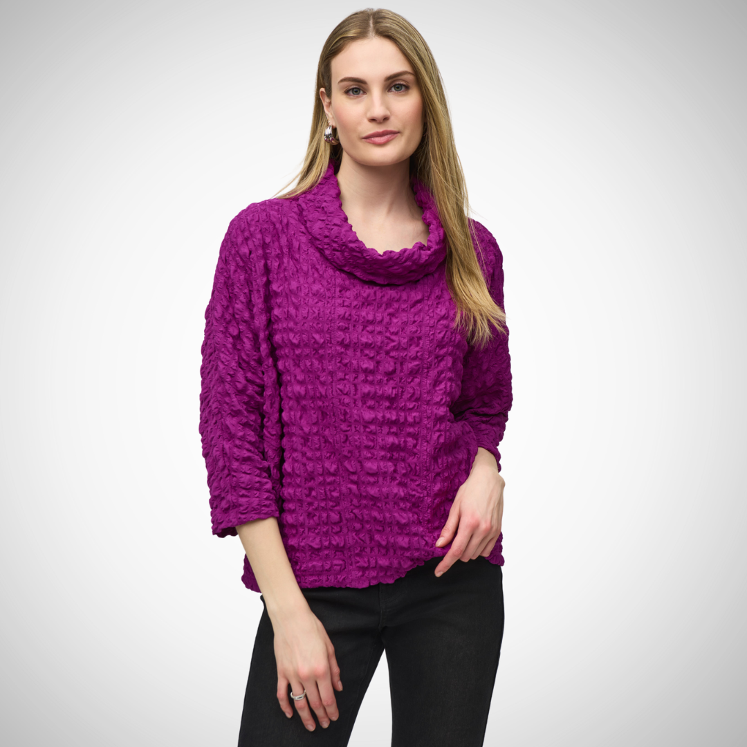 Pearls Boutique - Port Dover Ontario - Joseph Ribkoff - Textured Cowl Neck Top - Empress Pink  Colour.   Experience the luxurious richness of the Empress-coloured Textured Cowl Neck Top. This top boasts a flattering cowl neckline, relaxed fit, and luxuriously soft fabric with a subtle texture. The 3/4 sleeves allow for breathability while the modern straight-sleeve design adds a touch of style.&nbsp; Made with 96% Polyester and 4% Spandex.