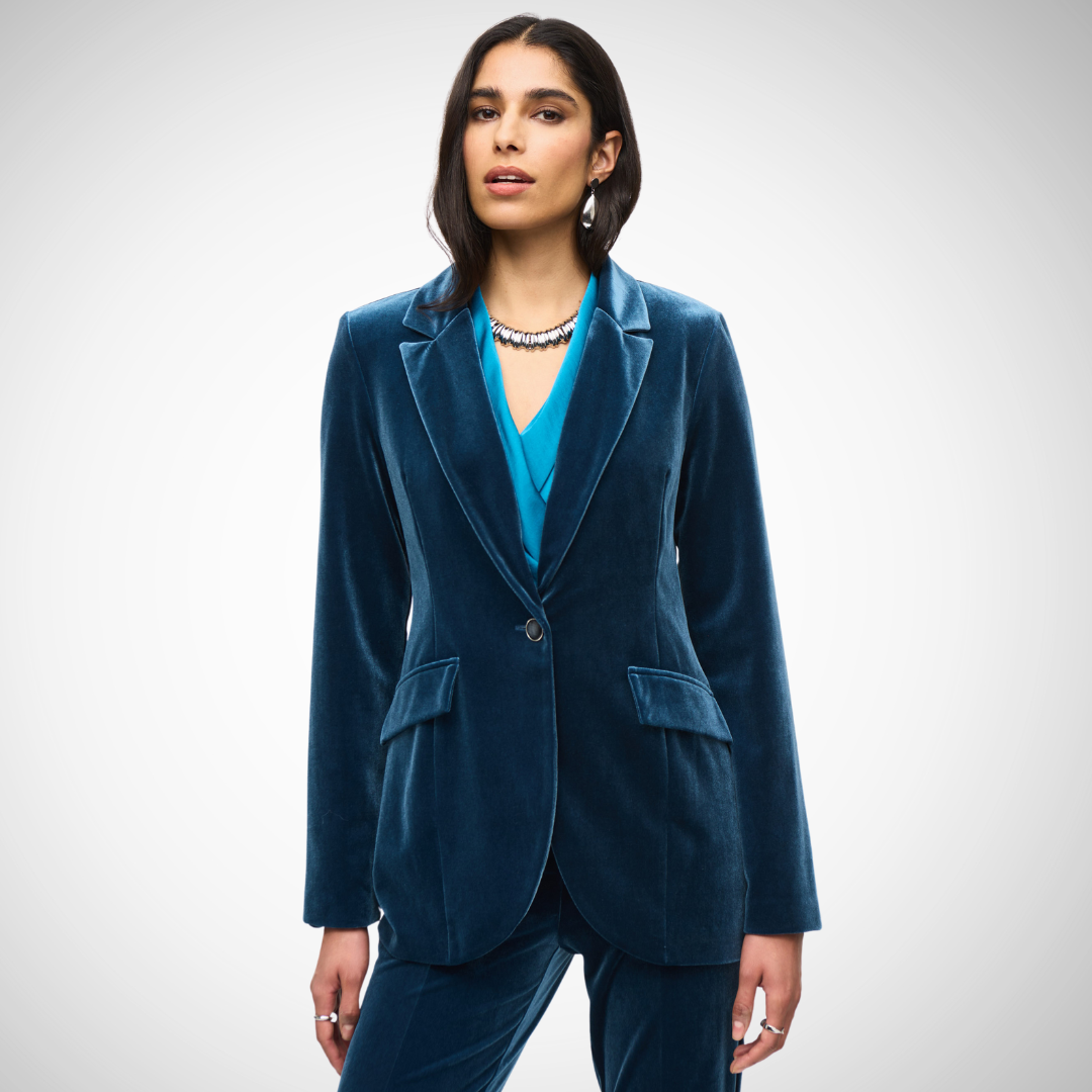 Pearls Boutique - Port Dover Ontario - Joseph Ribkoff Velvet Blazer - Teal, single breasted, button closure, knotched Lapel collar,      Experience pure luxury with the Joseph Ribkoff Velvet Blazer! This blazer from Joseph Ribkoff boasts a fancy notched collar, comfy regular fit, and stylish buttons that add a touch of class. The subtle pattern and single-breasted closure keep it sleek and sophisticated. Made with 98% Polyester and 2% Spandex.