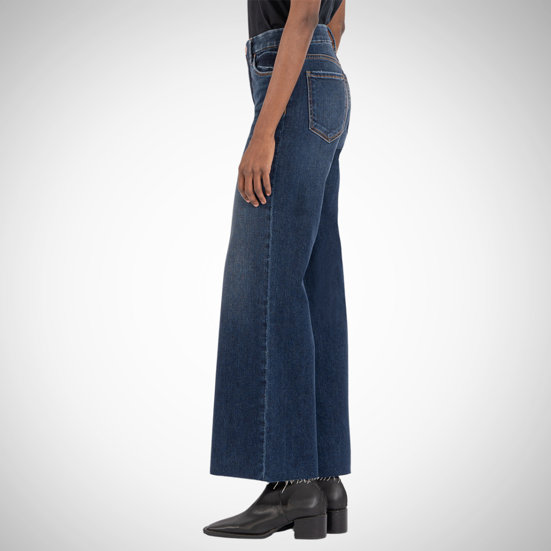 Pearls Boutique - Port Dover Ontario - KUT - Meg Fab Ab Wide Leg. Style: High-rise, wide-leg jeans Design: Classic 5-pocket styling, Fly front Fabric: 87% cotton, 12% polyester, 1% spandex Fit: Comfortable, flattering with Fab Ab front pockets Details: Raw hems for a trendy touch Measurements: 27" inseam, 23" leg opening, 10 1/2" rise Fit: Runs slightly oversized Color: Vintage-inspired "Exhibited Wash"