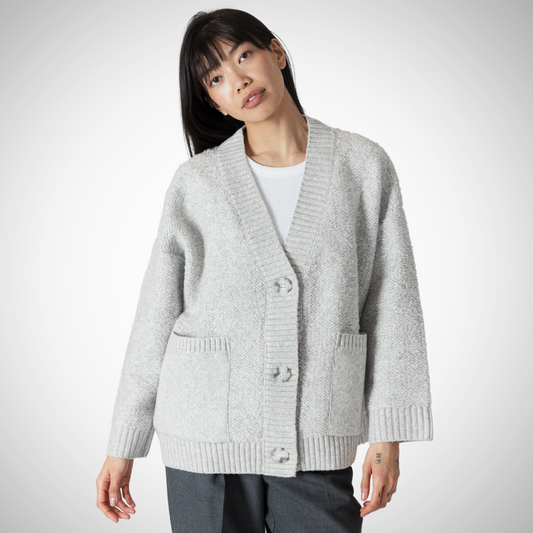 Pearls Boutique - Port Dover Ontario - Lyla + Lux  Silva Boucle Jacket - Light Heather Grey. Boxy boyfriend cut bouclé jacket Oversized and relaxed fit, ideal for layering Convenient pockets for added functionality and style Versatile design for casual or dressed-up occasions Made of 68% Acrylic, 28% Polyester, and 4% Elastane for chic comfort