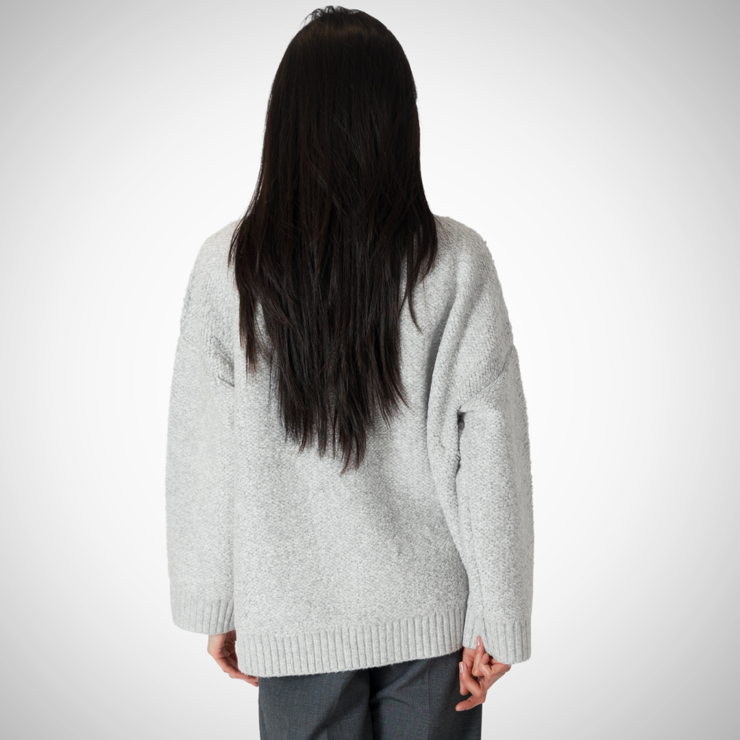 Pearls Boutique - Port Dover Ontario - Lyla + Lux  Silva Boucle Jacket - Light Heather Grey. Boxy boyfriend cut bouclé jacket Oversized and relaxed fit, ideal for layering Convenient pockets for added functionality and style Versatile design for casual or dressed-up occasions Made of 68% Acrylic, 28% Polyester, and 4% Elastane for chic comfort