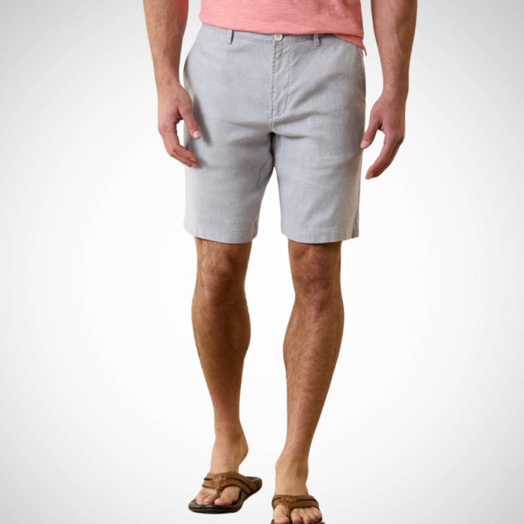 Pearls Boutique - Port Dover Ontario - Tommy Bahama - Mens Shorts - 10 Inch length, Flat Front, Fly and belt loops, 10 inch length, pockets. The Mens Tommy Bahama Beach Coast Linen Shorts will make a valuable addition to your wardrobe, thanks to the added stretch and multiple pockets for all your beachcombing needs. Made with a blend of 61% linen, 37% cotton, and 2% spandex, with a 10 inch flat front length.