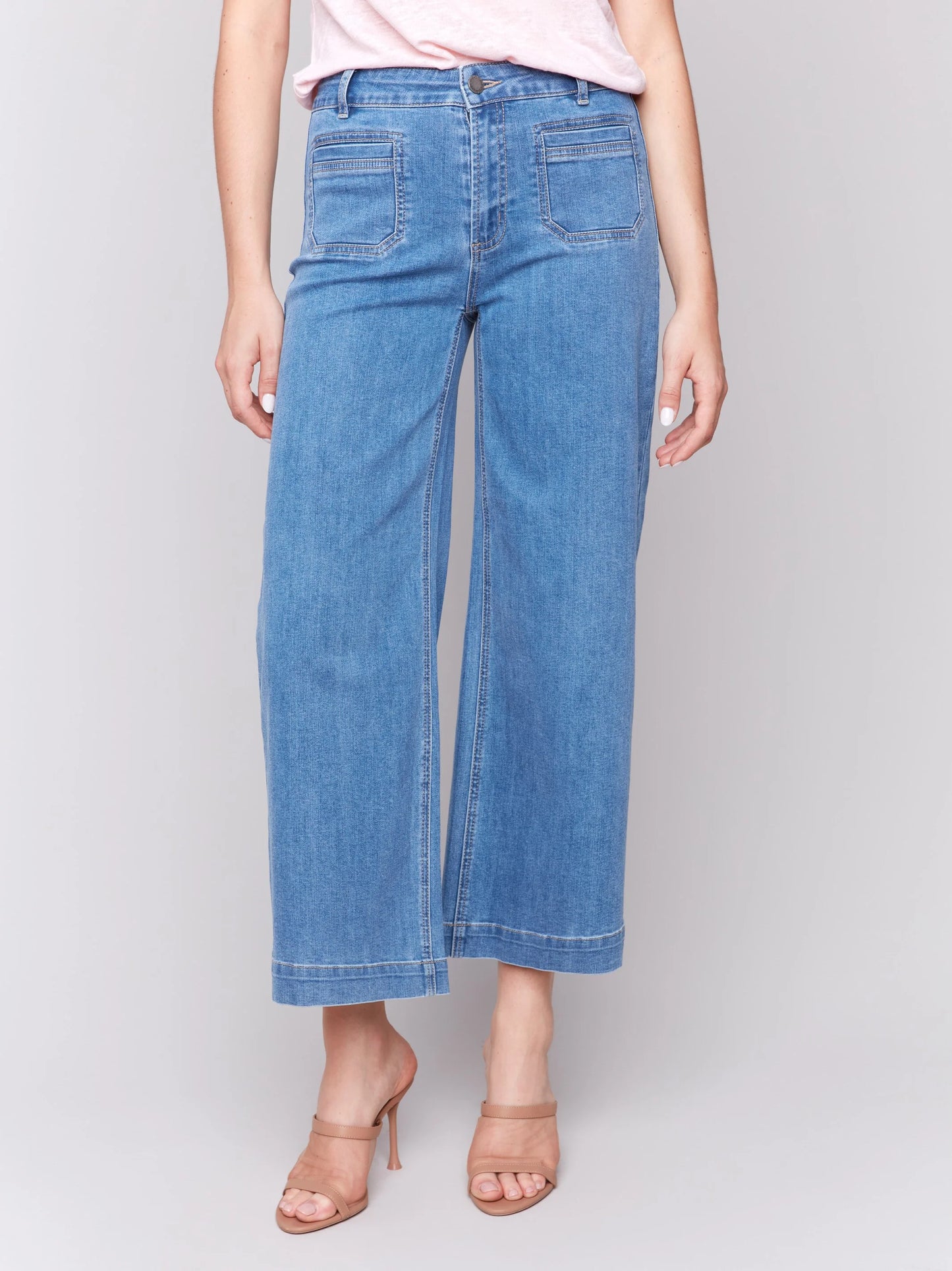 Pearls Boutique-Port Dover Ontario-Charlie B-patch-pocket-flare-jeans-jean-blue-jean-1-c5538
Flare fit for a retro-inspired silhouette

Cropped length for a fresh, modern look

Front patch pockets for added style and functionality

Stretch denim fabric for a comfortable, flexible fit

Regular rise waist for a flattering, classic fit

Available in white and medium denim blue for versatile styling