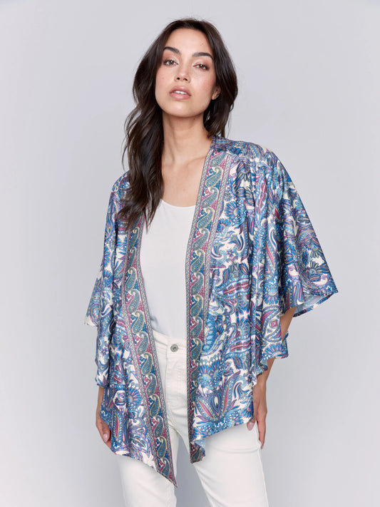 Pearls Boutique-Port Dover Ontario-Charlie B-printed-satin-kimono-cashmere colourway (soft blues, white, pink  paisley print)
Paisley Satin Kimono

Wide 3/4 Sleeves

Open-Front Design

Longer Front Hem

Paisley Print in Luxe Satin

Relaxed, Flowing Silhouette

Soft and Lightweight Fabric (97% Polyester, 3% Spandex)