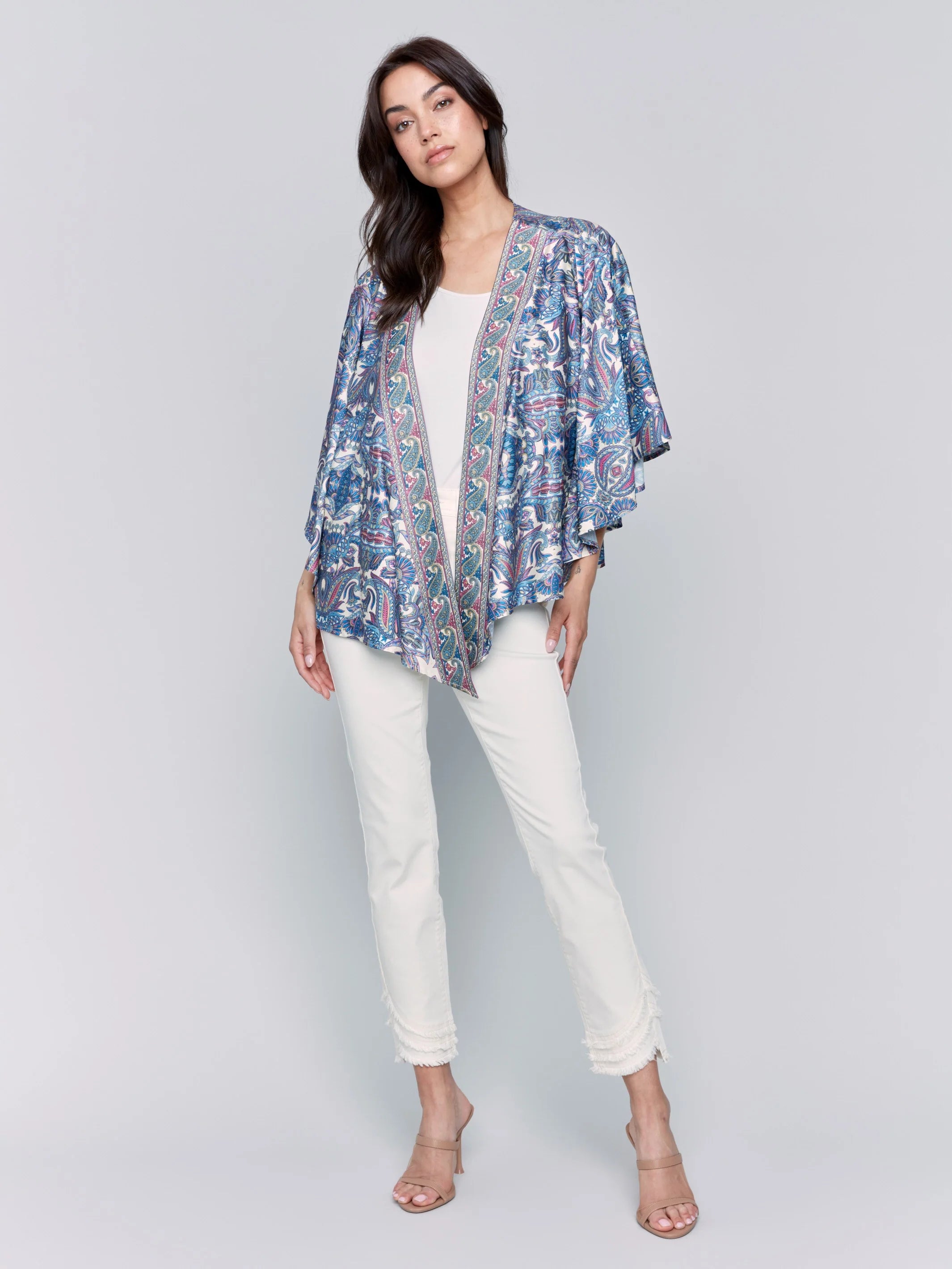 Pearls Boutique-Port Dover Ontario-Charlie B-printed-satin-kimono-cashmere colourway (soft blues, white, pink  paisley print)
Paisley Satin Kimono

Wide 3/4 Sleeves

Open-Front Design

Longer Front Hem

Paisley Print in Luxe Satin

Relaxed, Flowing Silhouette

Soft and Lightweight Fabric (97% Polyester, 3% Spandex)