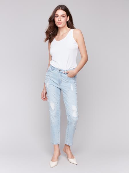 Pearls Boutique-Port Dover Ontario-Charlie B Pearl Applique Slim-Leg Jeans with Distressed Detail-light Blue-Style C5617-301B
Light blue slim-fit jeans with ankle-length cut

Distressed details with delicate pearl appliqué

Regular-rise waist for a flattering fit

Five-pocket design for everyday functionality
Made from stretch denim for comfort and flexibility

Chic blend of elegance and edgy style