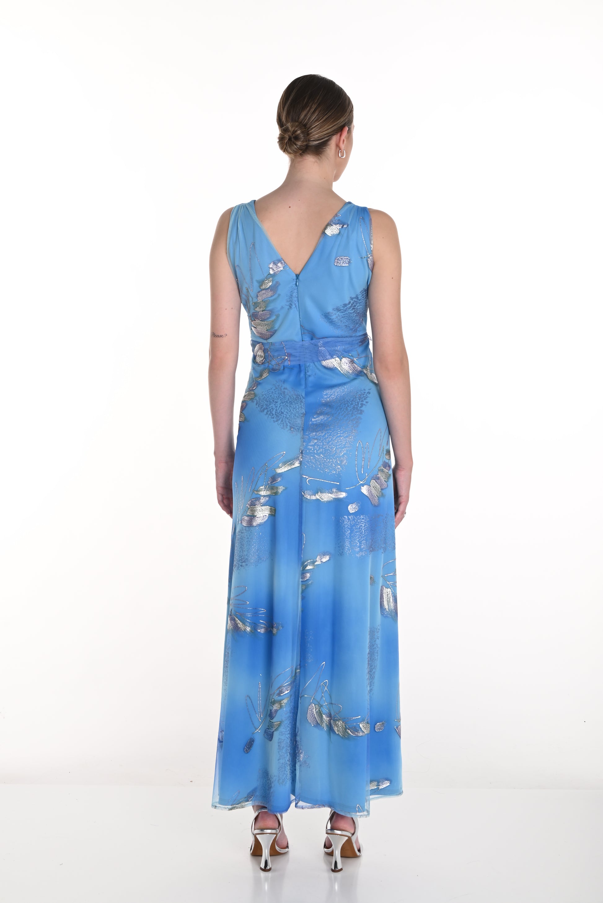 Pearls Boutique-Port Dover Ontario-Frank Lyman Frank Lyman Gown (Style 258207) – Elegant & Timeless

A-line, floor-length gown in a vibrant aqua and multi-shimmer palette
Sleeveless design for a sleek and modern look
Wrap-style bodice with waist tie for a flattering, feminine silhouette
Shimmering silver feather accents add glamour and sophistication
Lightweight & comfortable – crafted from 100% polyester
Maxi length creates a graceful, flowing movement
Proudly made in Canada for exceptional craftsmanship

