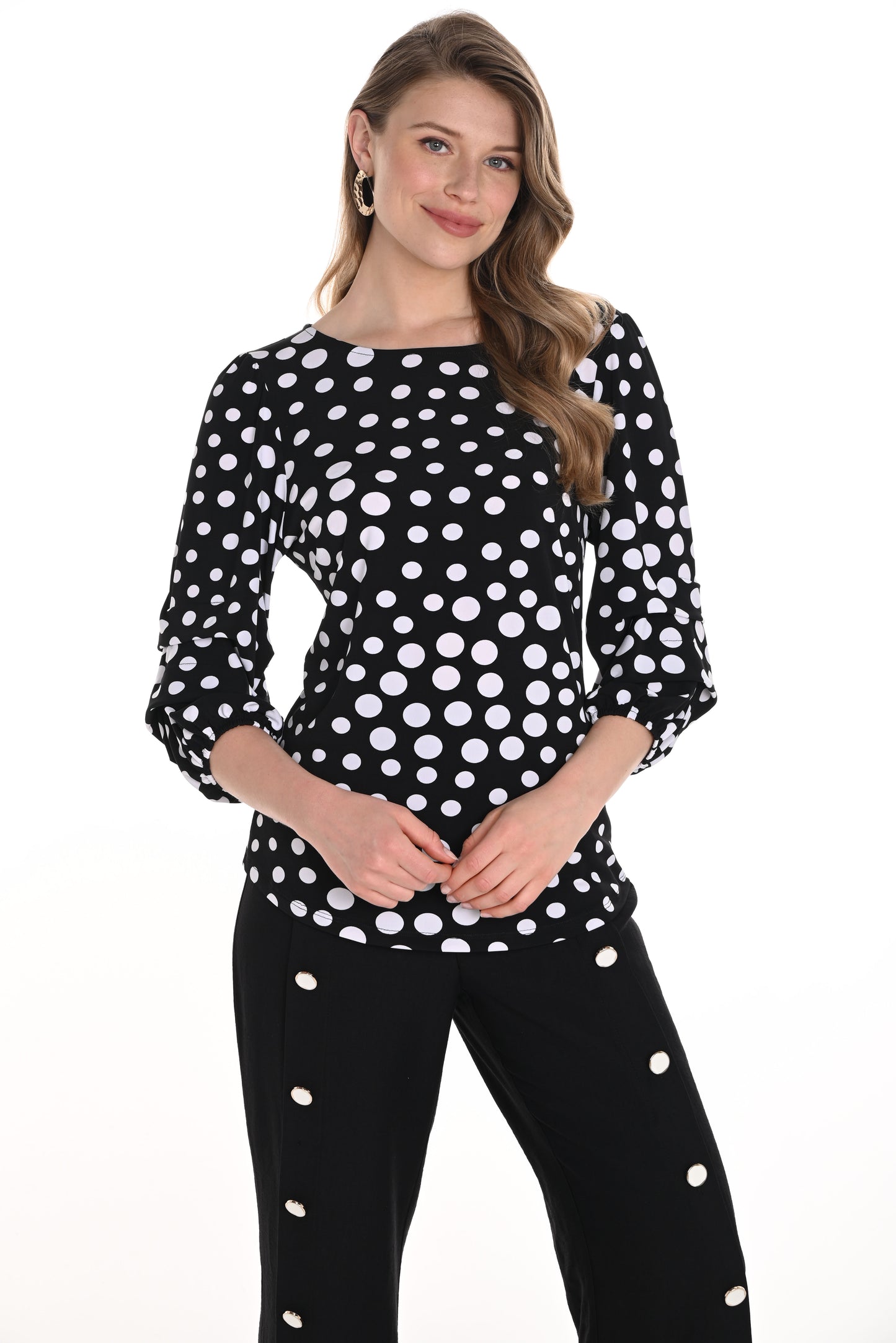 Pearls Boutique-Port Dover Ontario -Frank Lyman-Polka Dot Blouse 256309, featuring a hip-length, regular fit with a boat neckline and stylish 3/4 puff sleeves. Lightweight fabric with a trendy polka dot pattern adds effortless elegance, perfect for office wear or summer occasions.