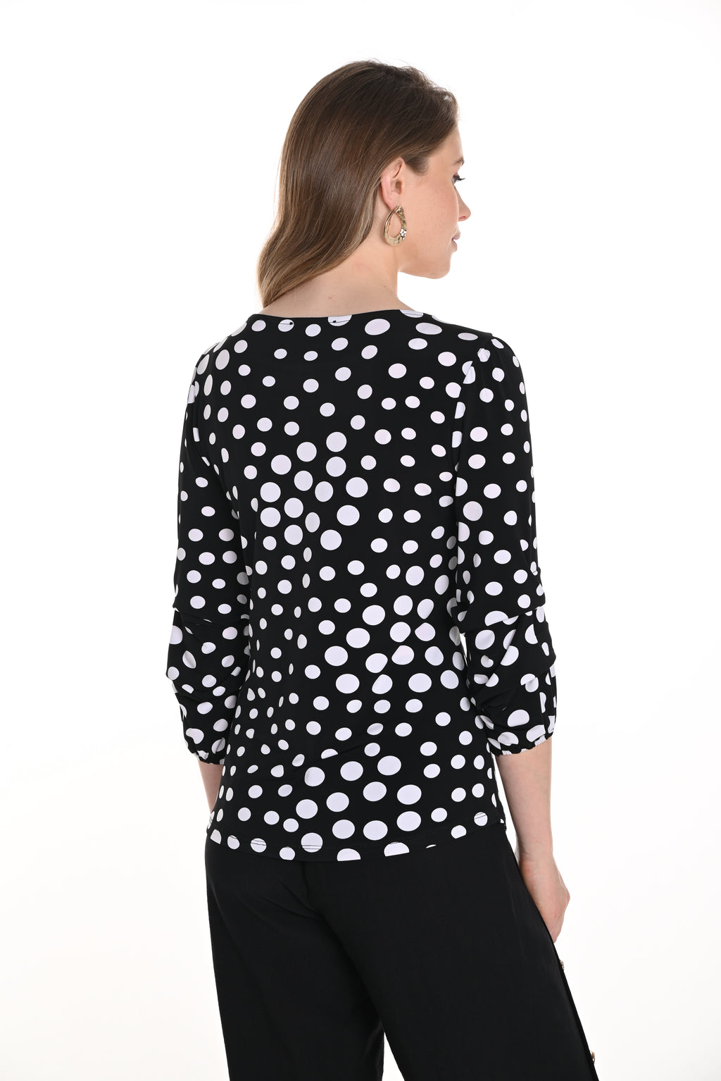 Pearls Boutique-Port Dover Ontario-Frank Lyman Polka Dot Blouse 256309, featuring a hip-length, regular fit with a boat neckline and stylish 3/4 puff sleeves. Lightweight fabric with a trendy polka dot pattern adds effortless elegance, perfect for office wear or summer occasions.