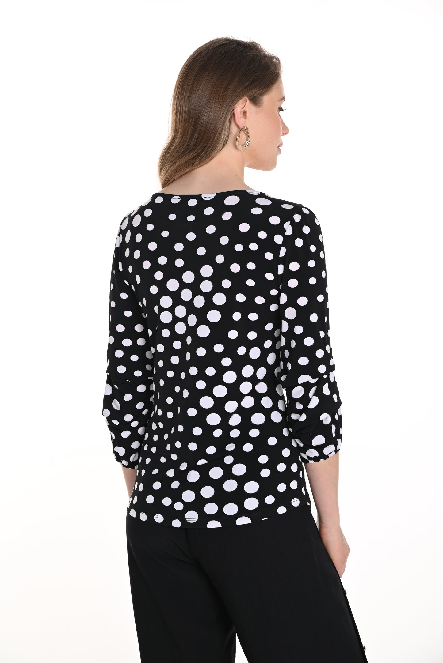 Pearls Boutique-Port Dover Ontario-Frank Lyman Polka Dot Blouse 256309, featuring a hip-length, regular fit with a boat neckline and stylish 3/4 puff sleeves. Lightweight fabric with a trendy polka dot pattern adds effortless elegance, perfect for office wear or summer occasions.