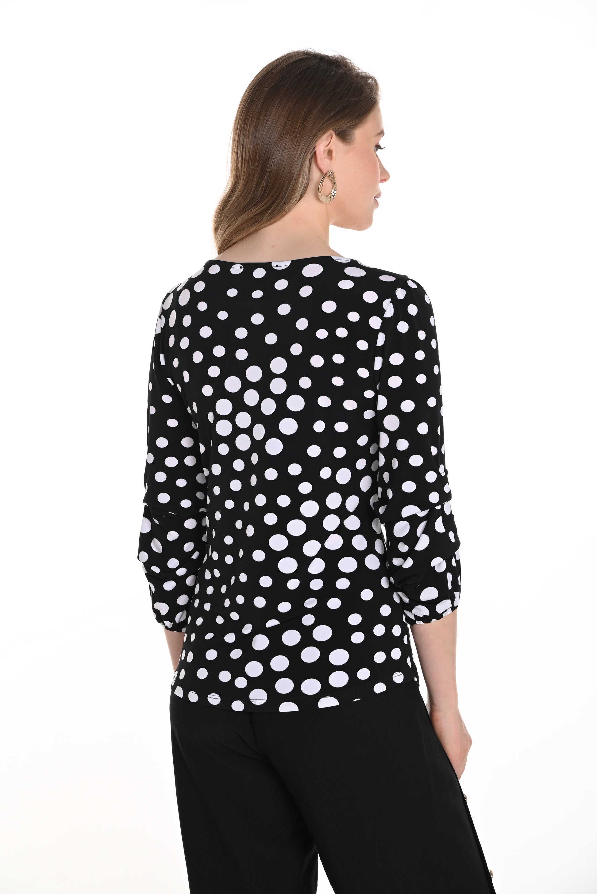 Pearls Boutique-Port Dover Ontario-Frank Lyman Polka Dot Blouse 256309, featuring a hip-length, regular fit with a boat neckline and stylish 3/4 puff sleeves. Lightweight fabric with a trendy polka dot pattern adds effortless elegance, perfect for office wear or summer occasions.