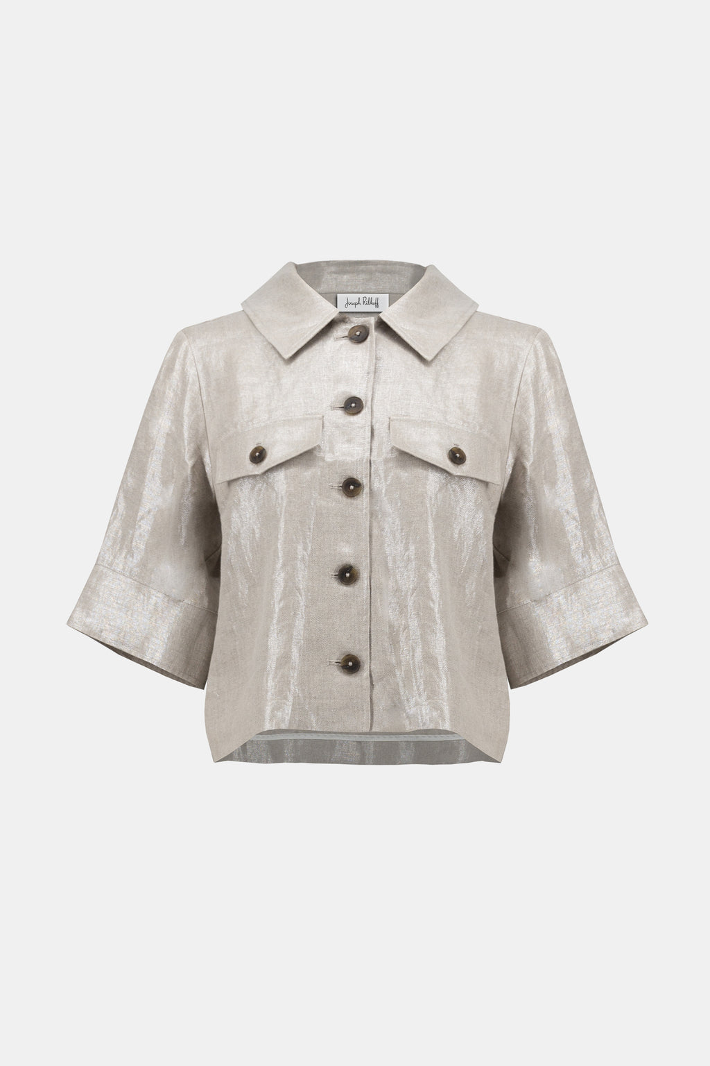 Pearls Boutique-Port Dover Ontario-Joseph Ribkoff-Foiled Linen Jacket-252921.A 100% linen Jacket in a pale gold woven foiled linen blend fabric, featuring a classic shirt collar and 3/4 cuffed sleeves. Designed with a front button closure, flap chest pockets, and contrast buttons. Unlined with a cropped boxy silhouette for a relaxed fit. Can be worn as a shirt or layered as a jacket. Care instructions include hand washing in cold water, avoiding bleach and tumble drying, and low ironing only if needed.