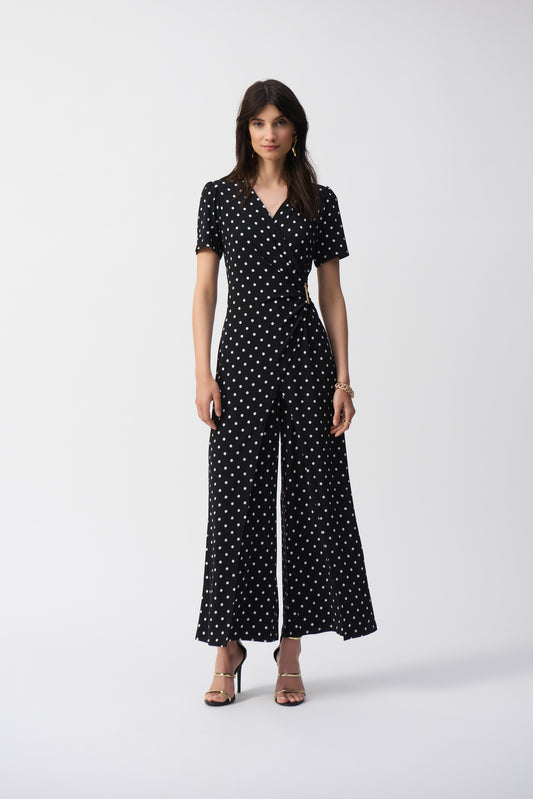 Pearls Boutique-Port Dover Ontario-Joseph Ribkoff- Polka Dot Wrap Jumpsuit (Style 251008), Canadian-made, black-and-white polka dot print, flattering wrap bodice, short sleeves, wide-leg pants, soft stretch fabric, wrinkle-resistant, travel-friendly.