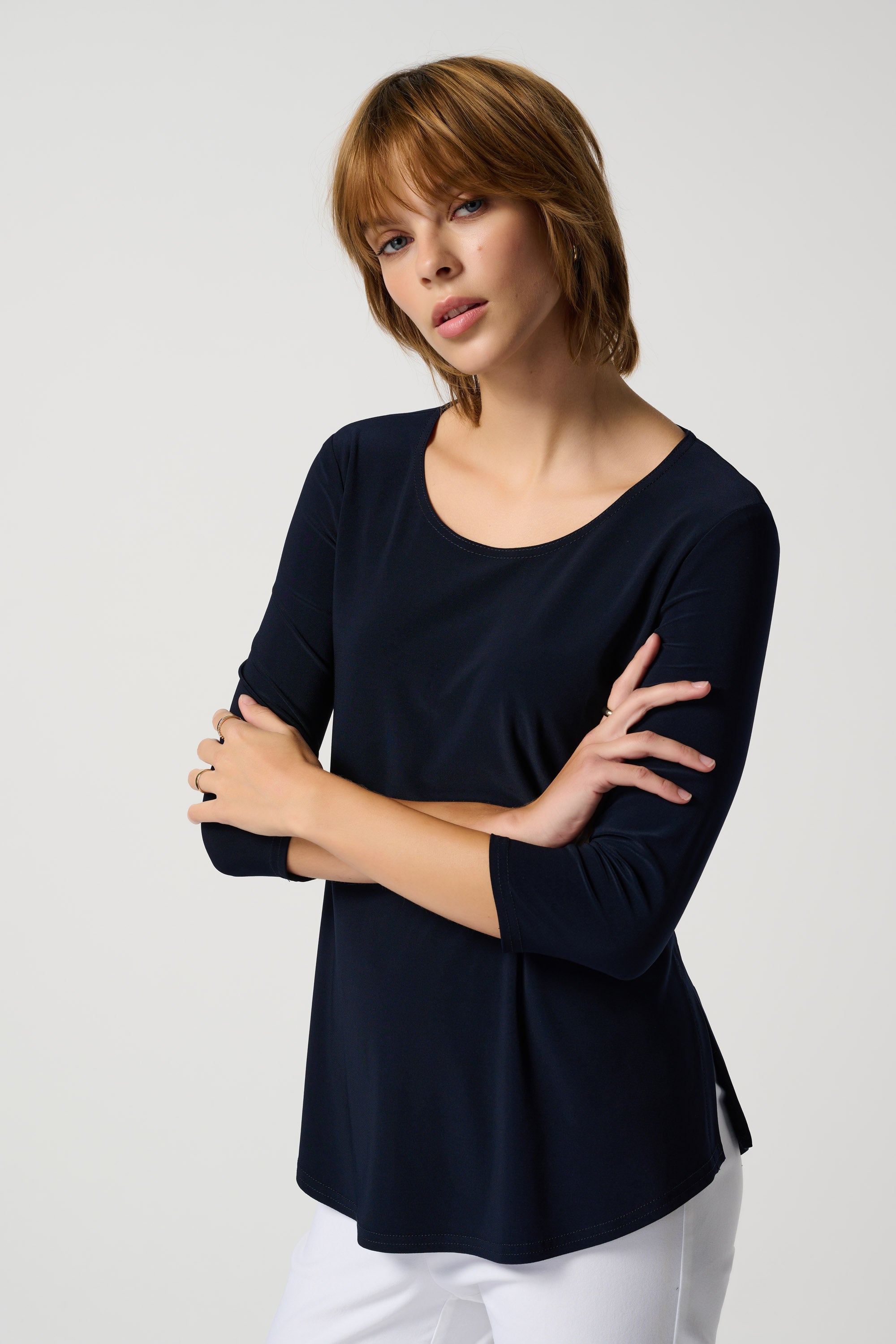 Pearls_Boutique-Port Dover Ontario-Joseph Ribkoff-Essential Long Sleeve Tee-183171S-2166
Elegant and comfortable top
3/4 sleeves and classic round neckline
Regular fit with hip-length design
Versatile for any occasion
Solid color with a touch of sophistication
Silky knit blend: 96% Polyester, 4% Spandex
Luxurious feel and effortless elegance