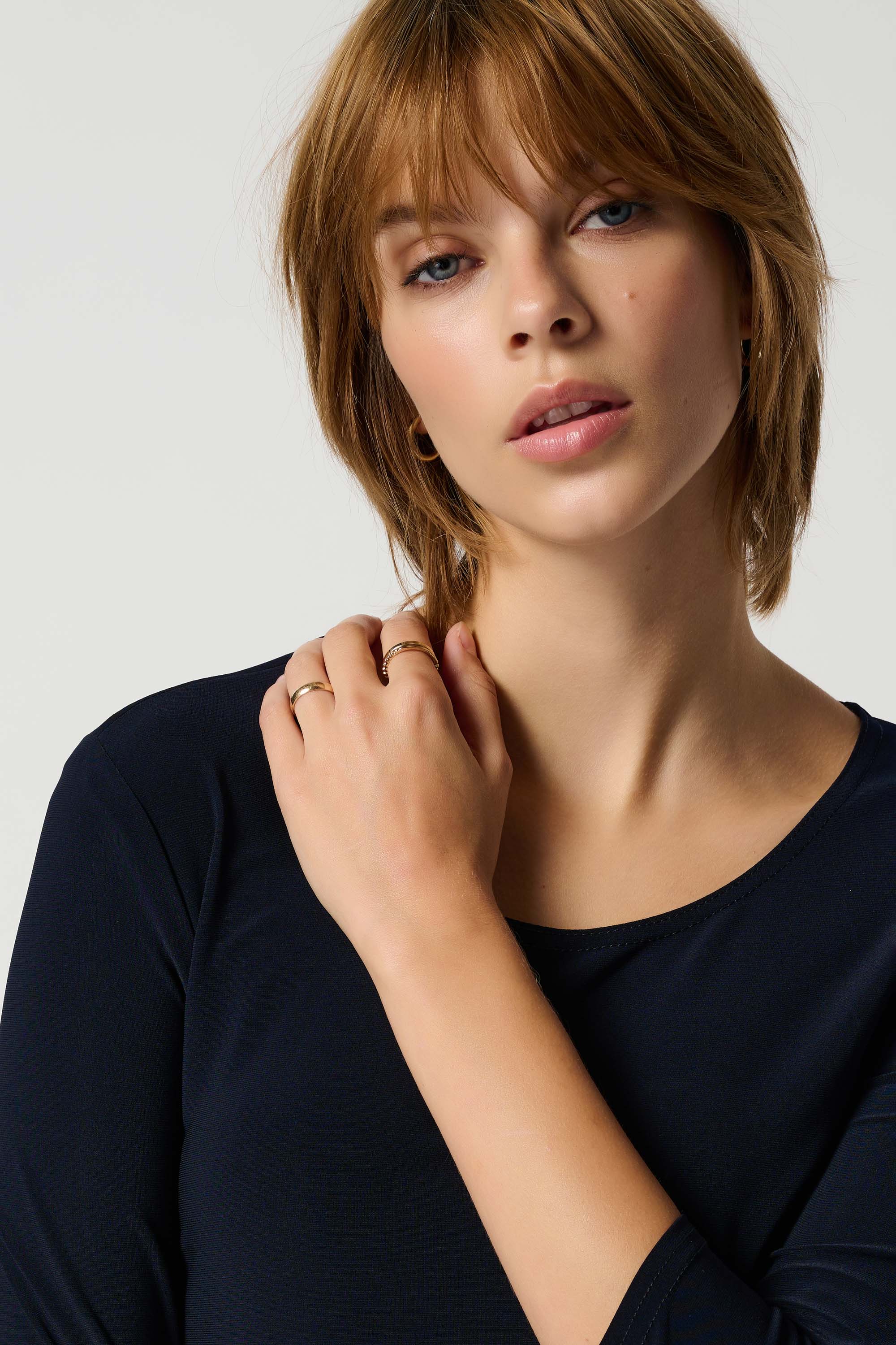 Pearls_Boutique-Port Dover Ontario-Joseph Ribkoff-Essential Long Sleeve Tee-183171S-2166
Elegant and comfortable top
3/4 sleeves and classic round neckline
Regular fit with hip-length design
Versatile for any occasion
Solid color with a touch of sophistication
Silky knit blend: 96% Polyester, 4% Spandex
Luxurious feel and effortless elegance