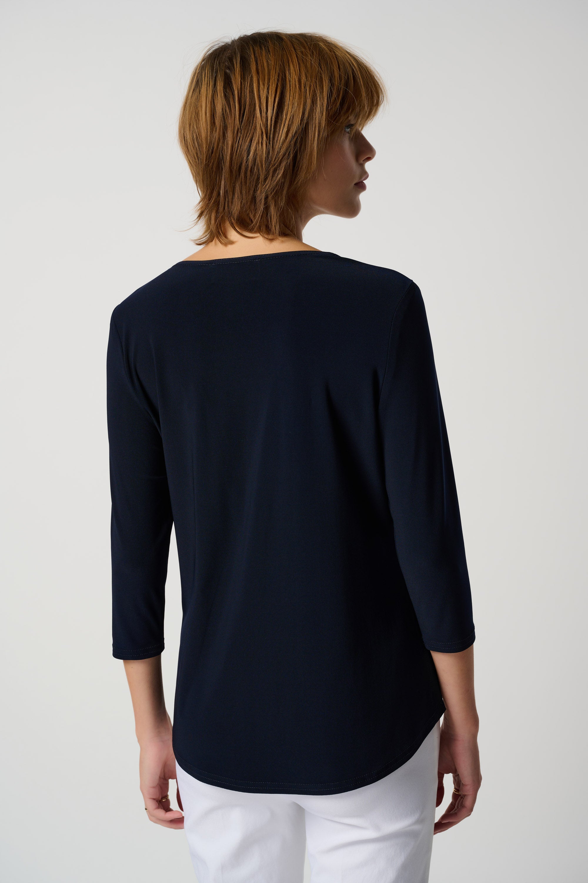 Pearls_Boutique-Port Dover Ontario-Joseph Ribkoff-Essential Long Sleeve Tee-183171S-2166
Elegant and comfortable top
3/4 sleeves and classic round neckline
Regular fit with hip-length design
Versatile for any occasion
Solid color with a touch of sophistication
Silky knit blend: 96% Polyester, 4% Spandex
Luxurious feel and effortless elegance