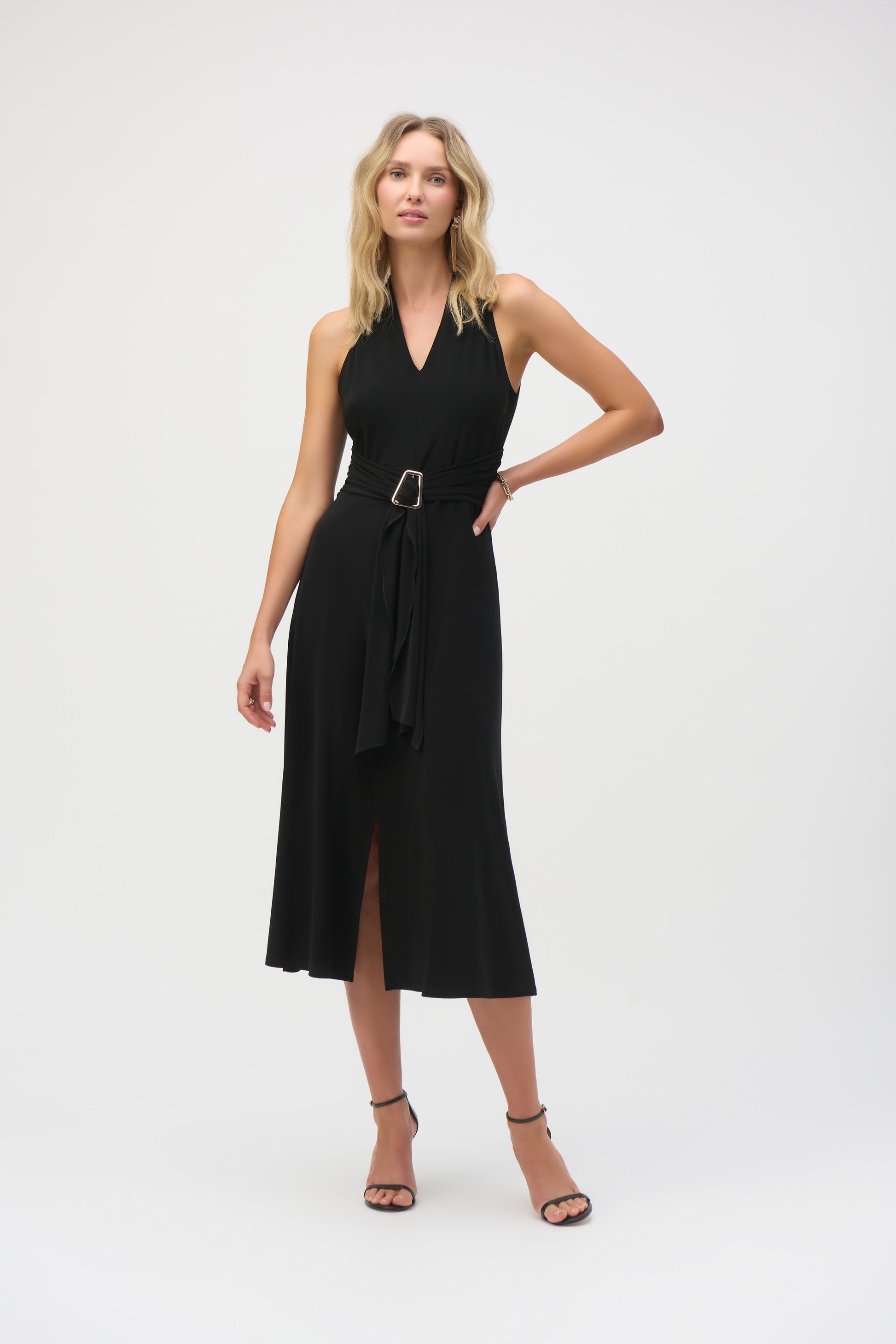 Pearls Boutique-Port Dover Ontario-Joseph Ribkoff - Silky Knit Fit and Flare Dress-252091-11. Black,
A sleek and sophisticated sleeveless midi-length dress crafted from silky knit fabric with stretch. Featuring a flattering V-neckline, chic faux halter design, and a front slit for added elegance. The adjustable waistband accentuates the waistline, while the shirred waist adds shape. Unlined for a lightweight feel. Easy-care fabric.