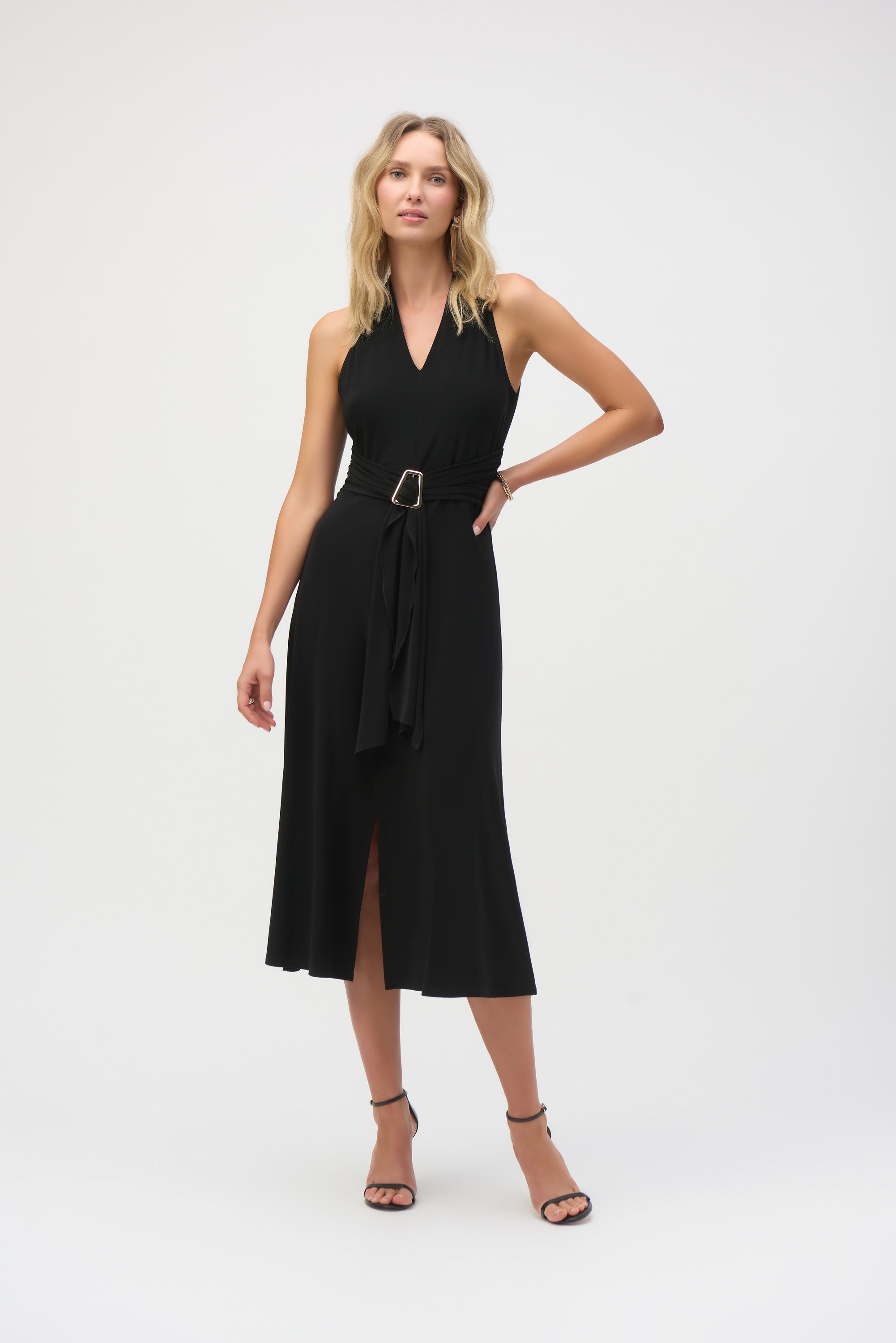 Pearls Boutique-Port Dover Ontario-Joseph Ribkoff - Silky Knit Fit and Flare Dress-252091-11. Black,
A sleek and sophisticated sleeveless midi-length dress crafted from silky knit fabric with stretch. Featuring a flattering V-neckline, chic faux halter design, and a front slit for added elegance. The adjustable waistband accentuates the waistline, while the shirred waist adds shape. Unlined for a lightweight feel. Easy-care fabric.