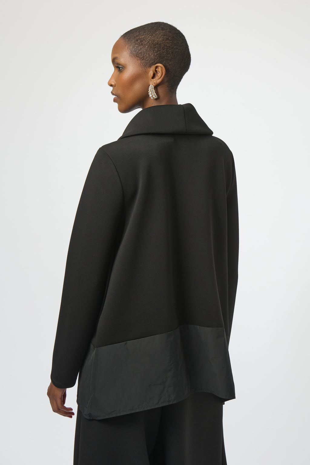 Pearls Boutique-Port Dover Ontario-Joseph Ribkoff | Scuba Jersey and Memory Trapeze |Tunic-254004- colour Black 
Joseph Ribkoff trapeze tunic in scuba jersey and memory fabric with cowl collar, 
long sleeves, and minimalist side pocket in a sculptural silhouette.