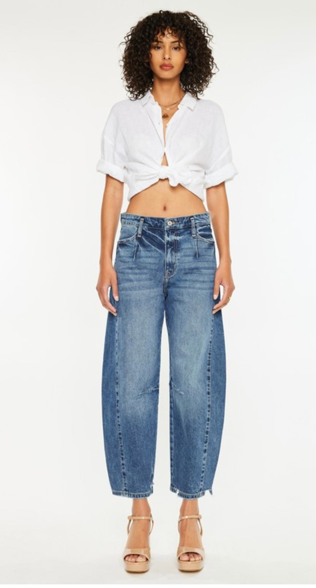 Pearls Boutique-Port Dover Ontario-Low-slung horseshoe fit jeans, dark wash, comfort stretch, zipper fly, belt loops shifted down, faux welt pockets, light orchid tint

Oversized fit with barrel leg and tapered bottom

Rise 12"&nbsp;

Inseam 17"

84% Cotton, 15% Lyocell, 1% Spandex

11.5 OZ
