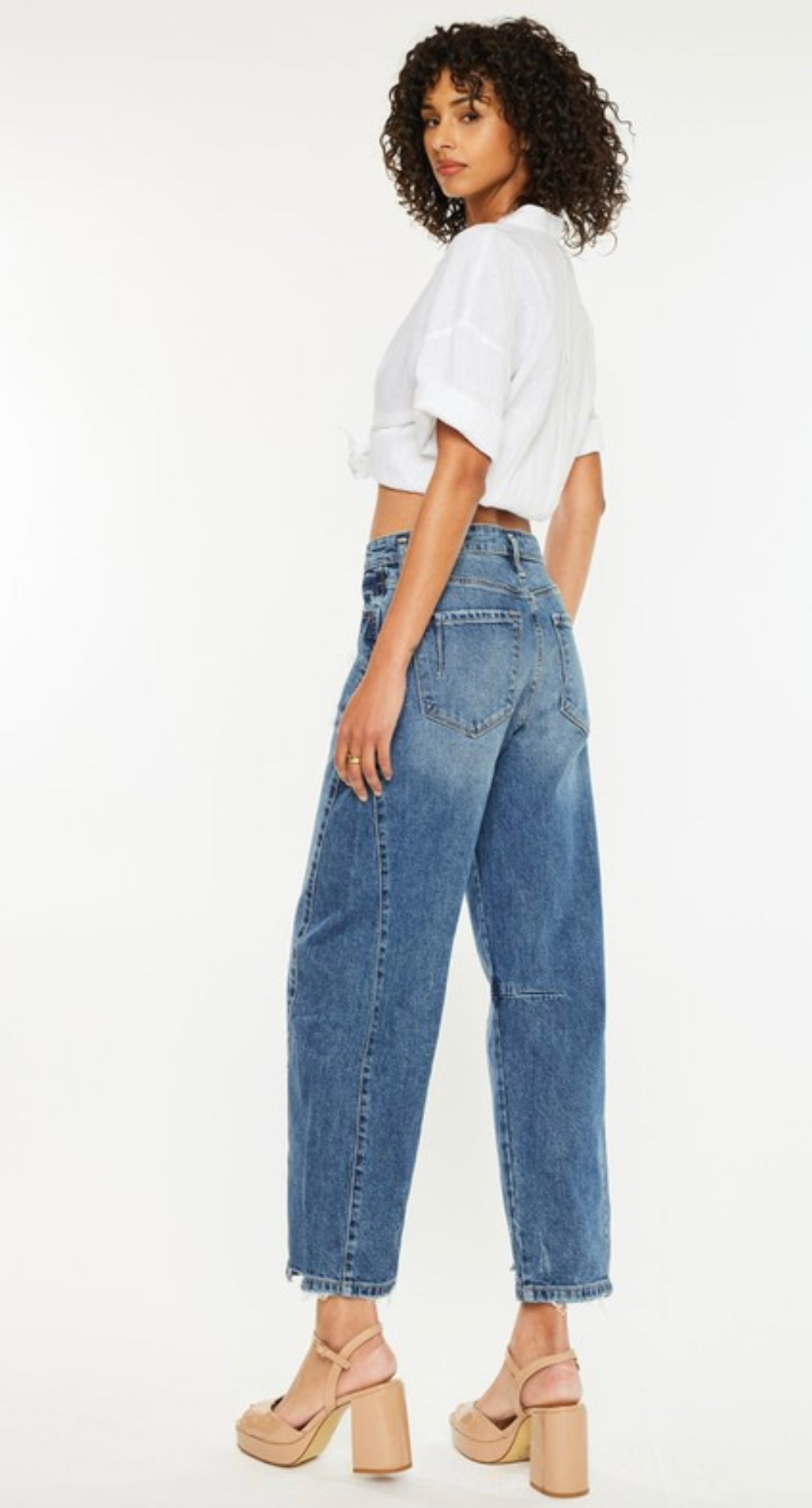 Pearls Boutique-Port Dover Ontario-Low-slung horseshoe fit jeans, dark wash, comfort stretch, zipper fly, belt loops shifted down, faux welt pockets, light orchid tint

Oversized fit with barrel leg and tapered bottom

Rise 12"&nbsp;

Inseam 17"

84% Cotton, 15% Lyocell, 1% Spandex

11.5 OZ