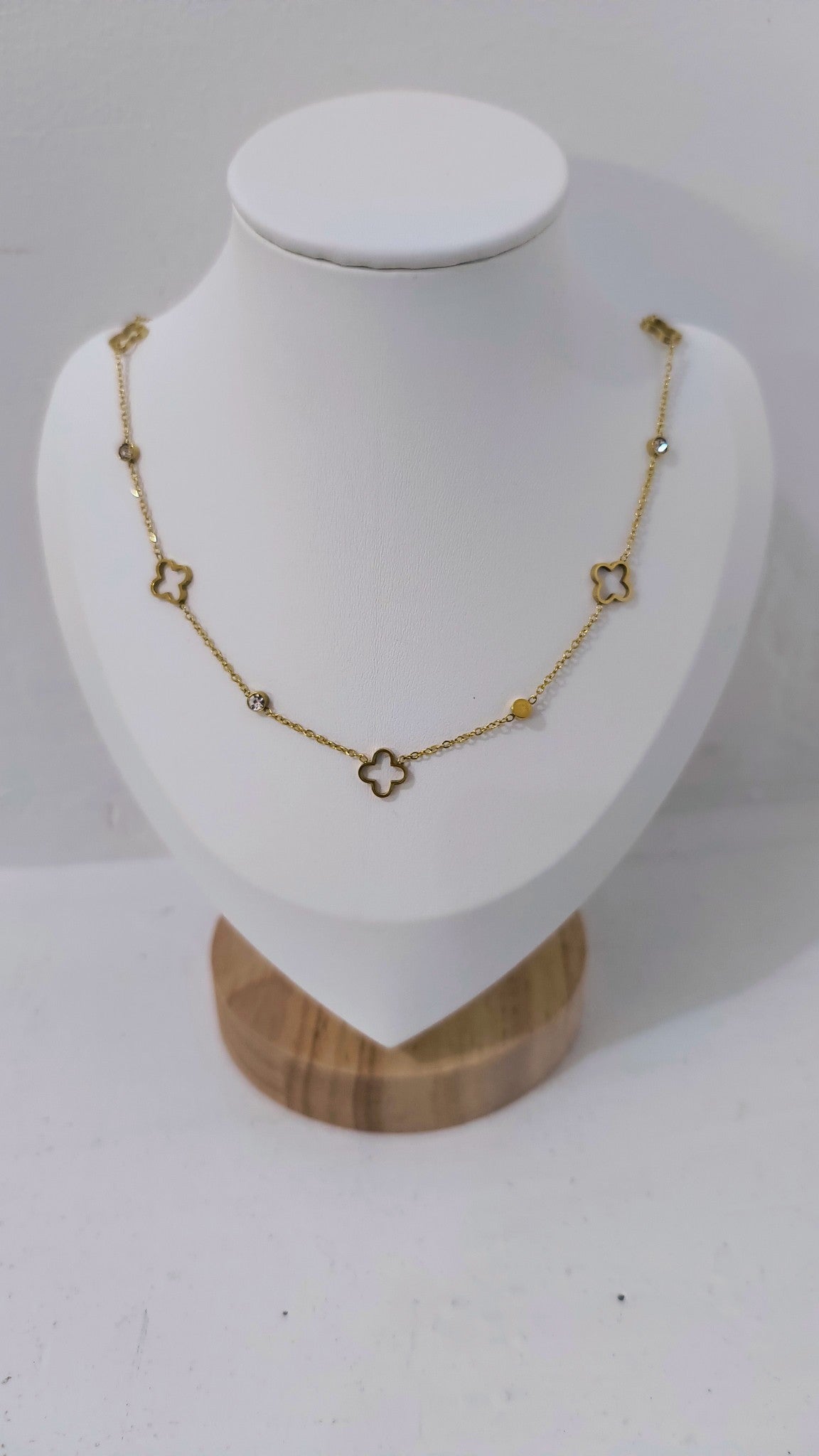 Pearls_Boutique-Port_Dover_Ontario-_Clover_Crystal_Necklace-_Gold
Delicate floating clover necklace with shimmering crystal details between each clover, available in hypoallergenic plated silver or gold. Feminine and chic, perfect for everyday wear or special occasions. Ideal for layering or pairing with matching clover jewelry for a timeless, elegant look