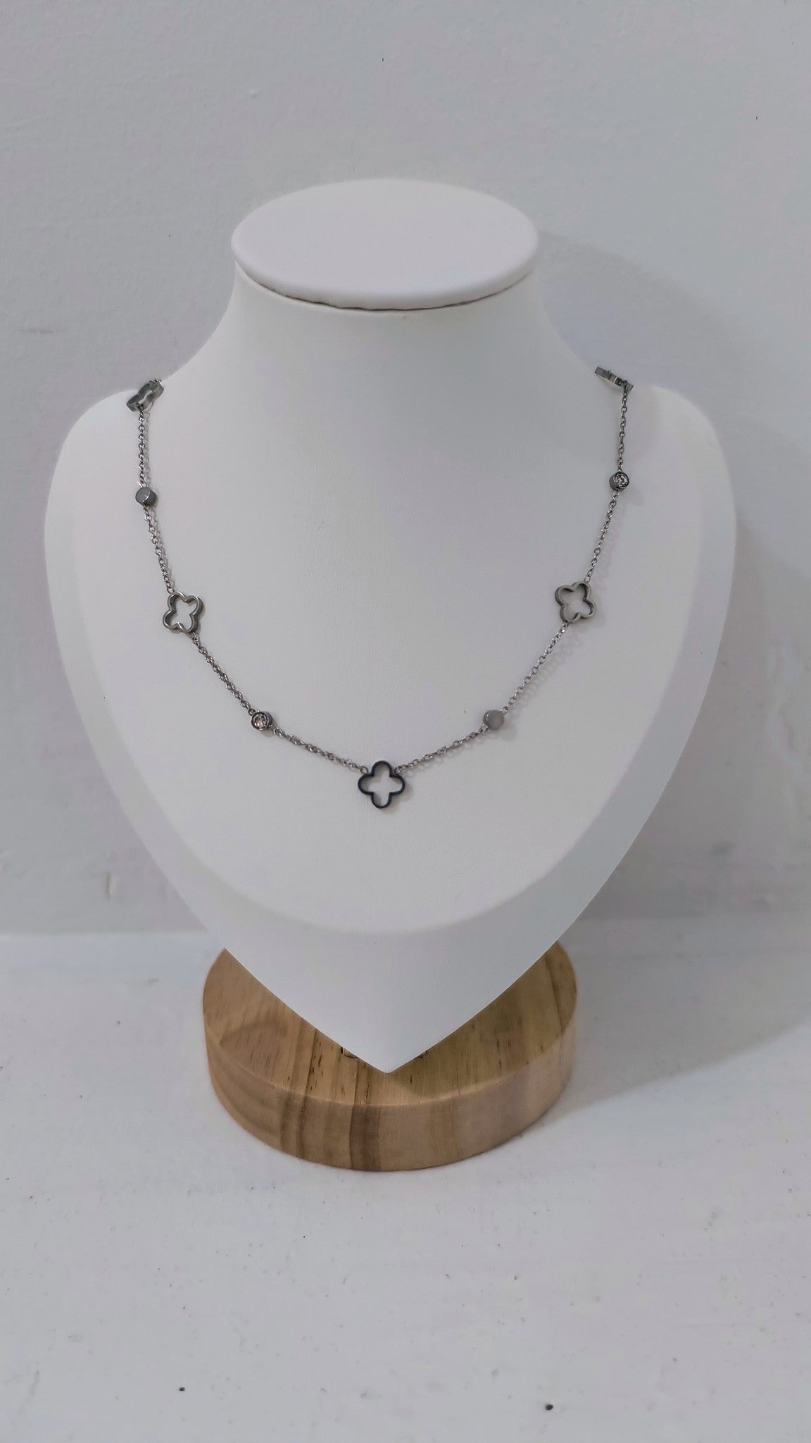 Pearls_Boutique-Port_Dover_Ontario-_Clover_Crystal_Necklace-Silver Delicate floating clover necklace with shimmering crystal details between each clover, available in hypoallergenic plated silver or gold. Feminine and chic, perfect for everyday wear or special occasions. Ideal for layering or pairing with matching clover jewelry for a timeless, elegant look.
