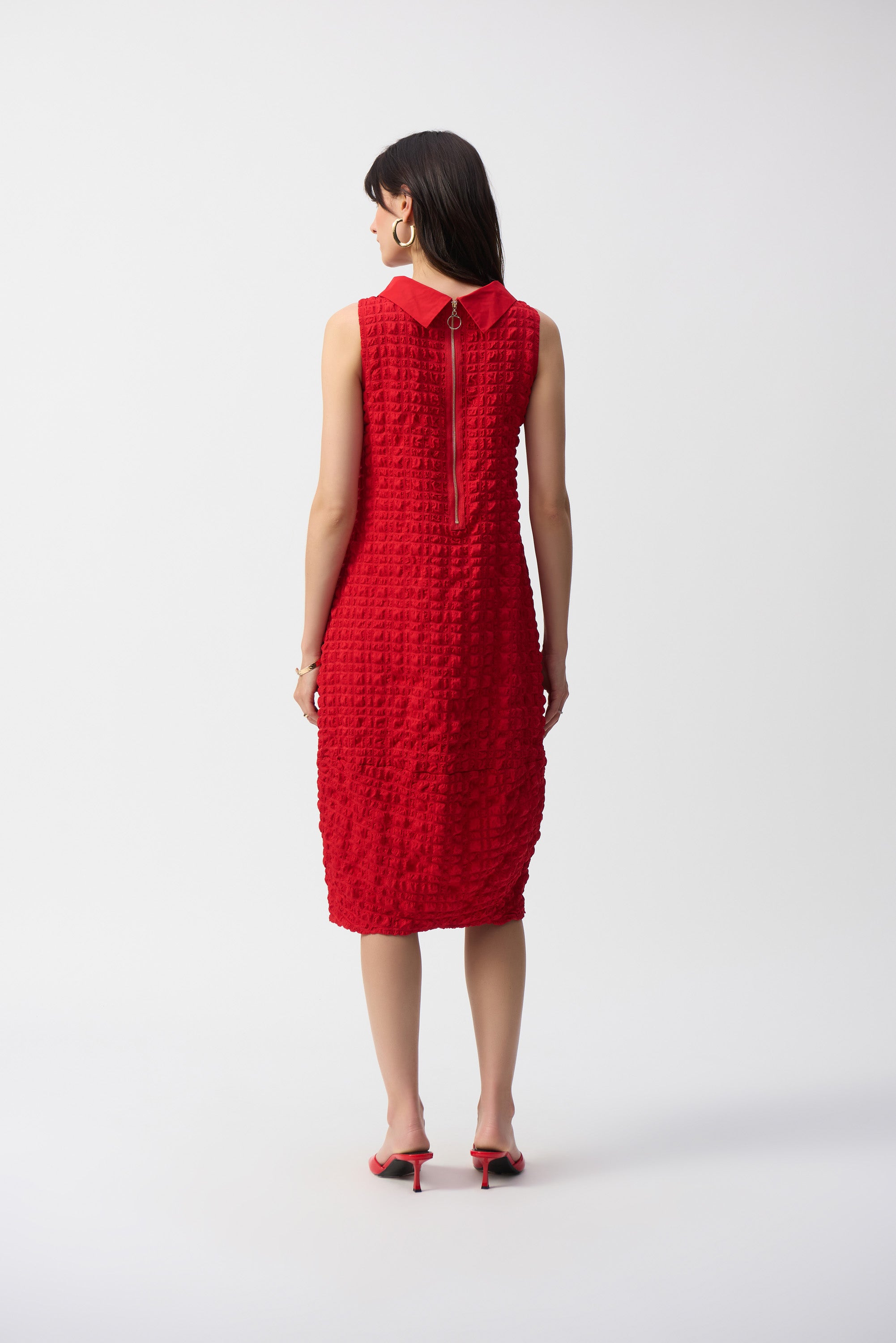 Pearls Boutique- Port Dover- Ontario-
Joseph Ribkoff Radiant Red Shift Dress 241204
Classic Shift Silhouette – Flattering, elegant, and comfortable for all-day wear.
Radiant Red Hue – Bold, sophisticated, and confidence-boosting.
Round Neck & Sleeveless.
Textured Fabric .
Pockets & Zipper Closure – Practical without compromising style.
Premium Fabric – 50% Viscose Rayon, 47% Polyester, 3% Spandex for breathable comfort.
Made in Canada – Quality craftsmanship and design.