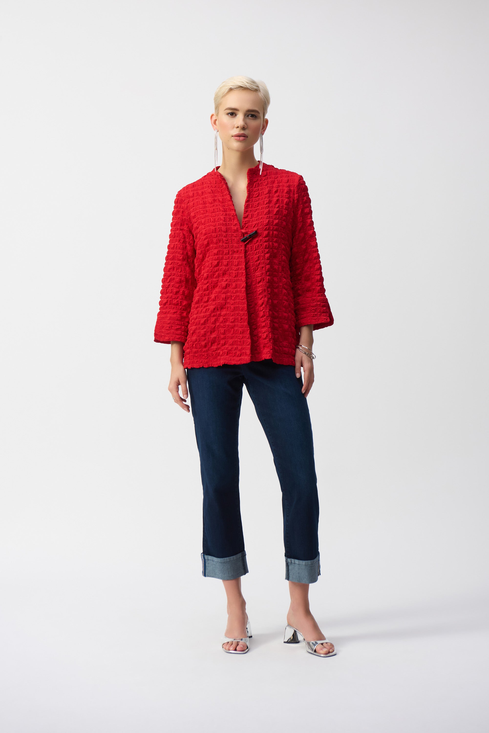 Pearls Boutique- Port Dover Ontario-Joseph Ribkoff Textured Jacket- 251034-Red, Spring 2025 Collection, made in Canada, chic textured finish, sleek closure detail, 3/4 length sleeves, A-line silhouette, relaxed fit through bodice, premium stretch fabric, vibrant colour options, sophisticated and stylish layering piece.







