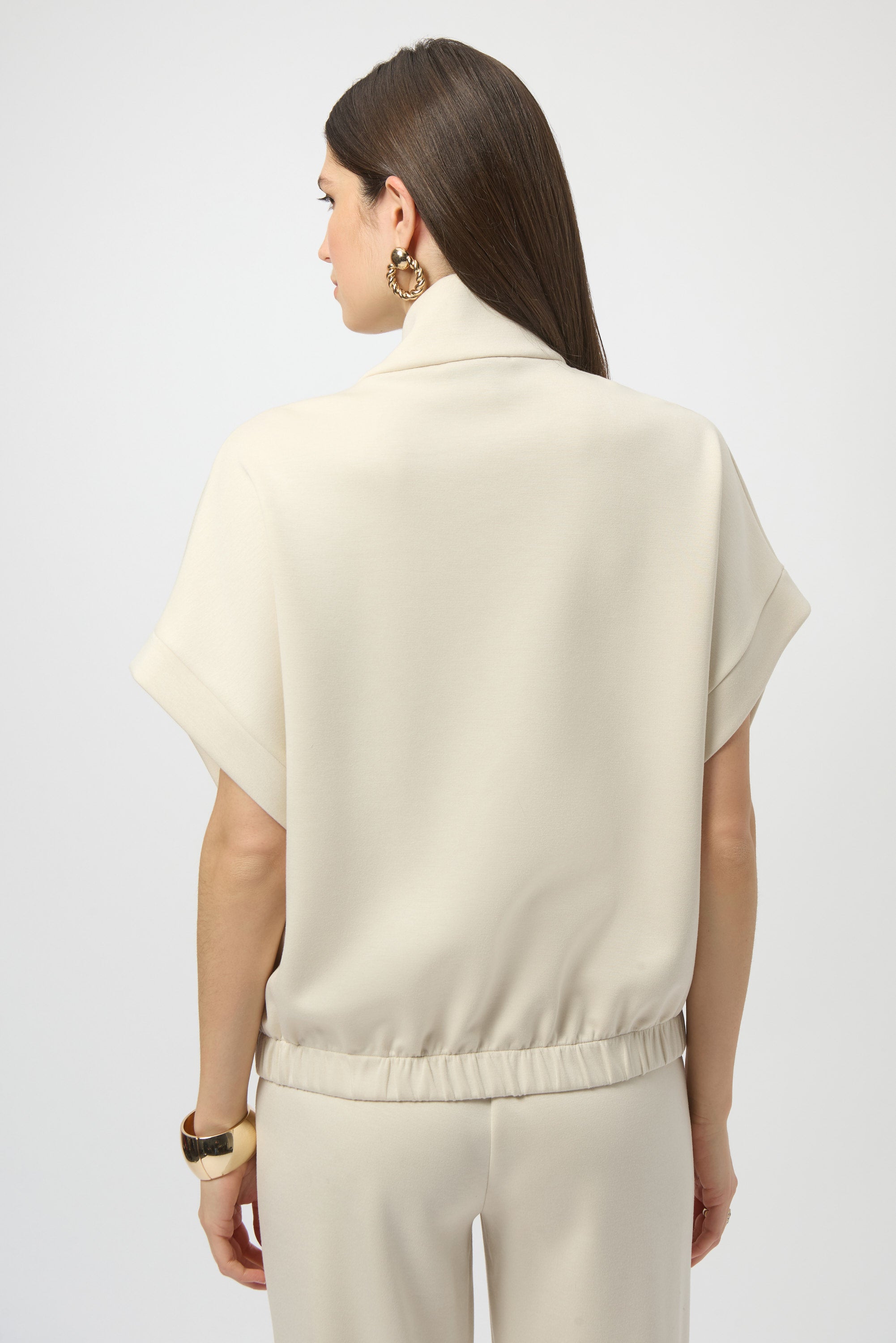 Pearls Boutique- Port Dover Ontario-Joseph Ribkoff- boxy scuba jersey jacket- 254145. colour birch. with short dolman sleeves, stand collar, front zip closure, welt pockets, and signature JR coin detail.

