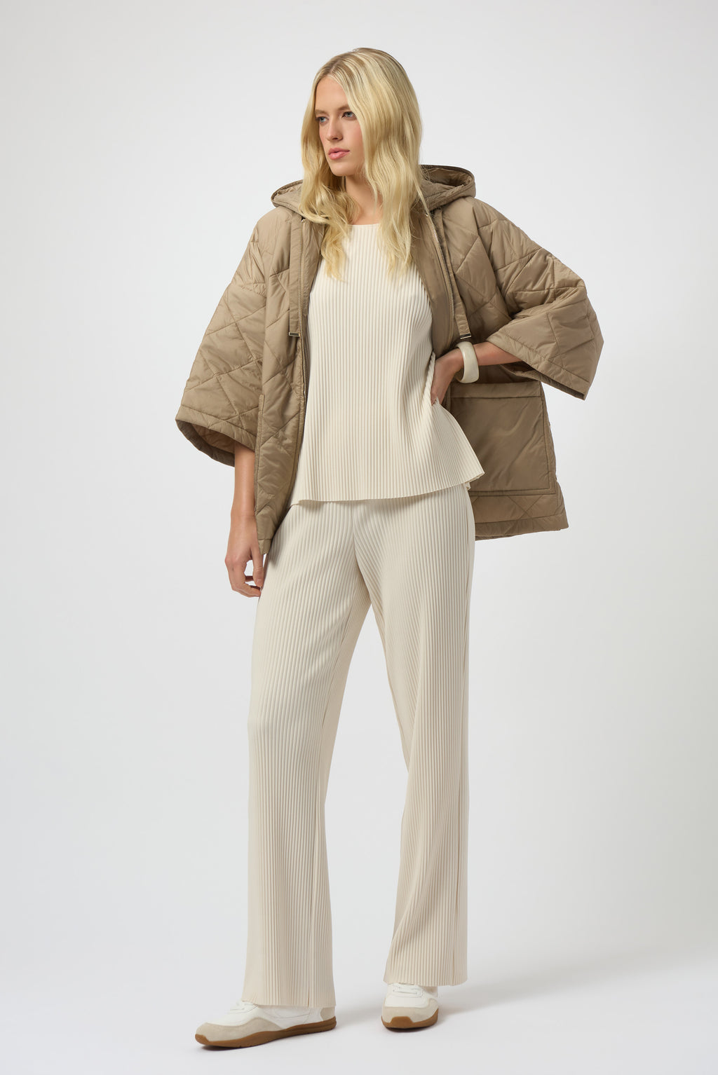 Pearls Boutique-Port Dover Ontario-Joseph Ribkoff | Pleated Scuba Crepe Boxy Top-Colour Birch
– Lightweight scuba crepe with subtle structure
– Delicate pleating for added movement and dimension
– Flattering scoop neckline with soft drape
– Three-quarter dolman sleeves for a contemporary finish
– Relaxed, boxy silhouette for all-day comfort