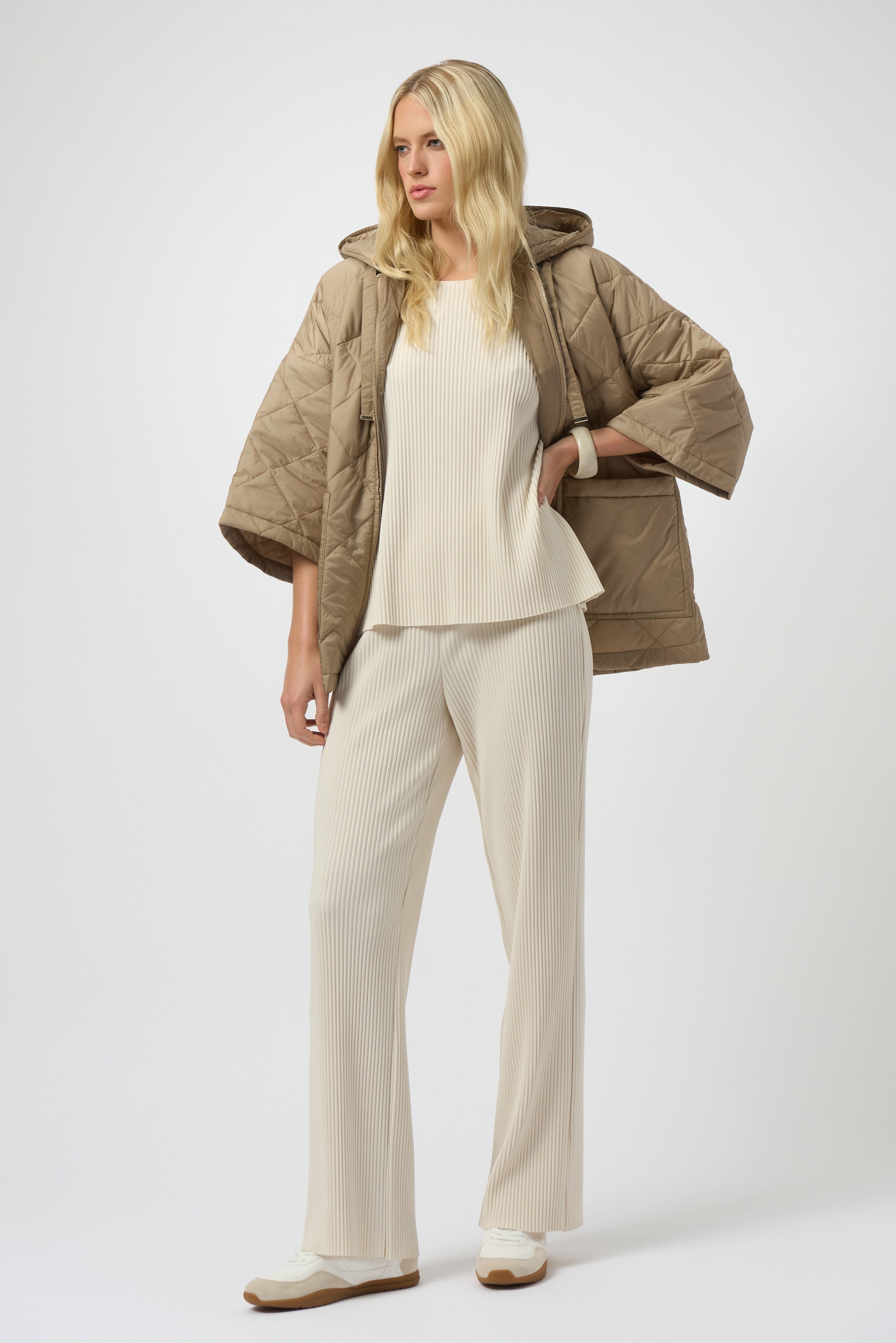 Pearls Boutique-Port Dover Ontario-Joseph Ribkoff | Pleated Scuba Crepe Boxy Top-Colour Birch
– Lightweight scuba crepe with subtle structure
– Delicate pleating for added movement and dimension
– Flattering scoop neckline with soft drape
– Three-quarter dolman sleeves for a contemporary finish
– Relaxed, boxy silhouette for all-day comfort
