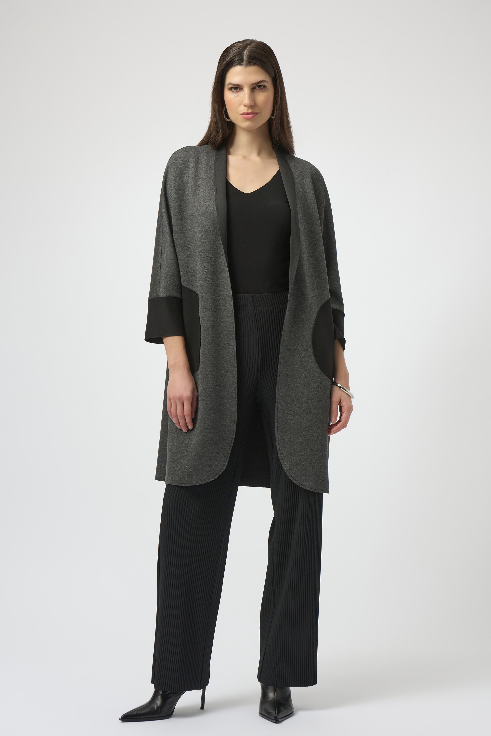 Pearls Boutique- Port Dover Ontario-Joseph Ribkoff | Scuba Jersey | Cover-Up-254040
Joseph Ribkoff mélange scuba jersey cover-up with V-neckline, long dolman sleeves, and patch pockets in a soft, structured knit.