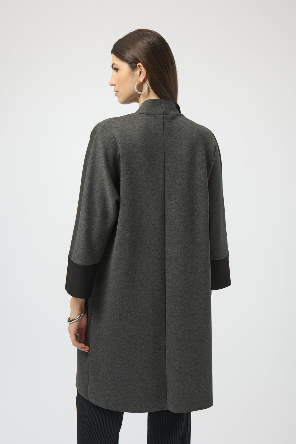 Pearls Boutique- Port Dover Ontario-Joseph Ribkoff | Scuba Jersey | Cover-Up-254040
Joseph Ribkoff mélange scuba jersey cover-up with V-neckline, long dolman sleeves, and patch pockets in a soft, structured knit.