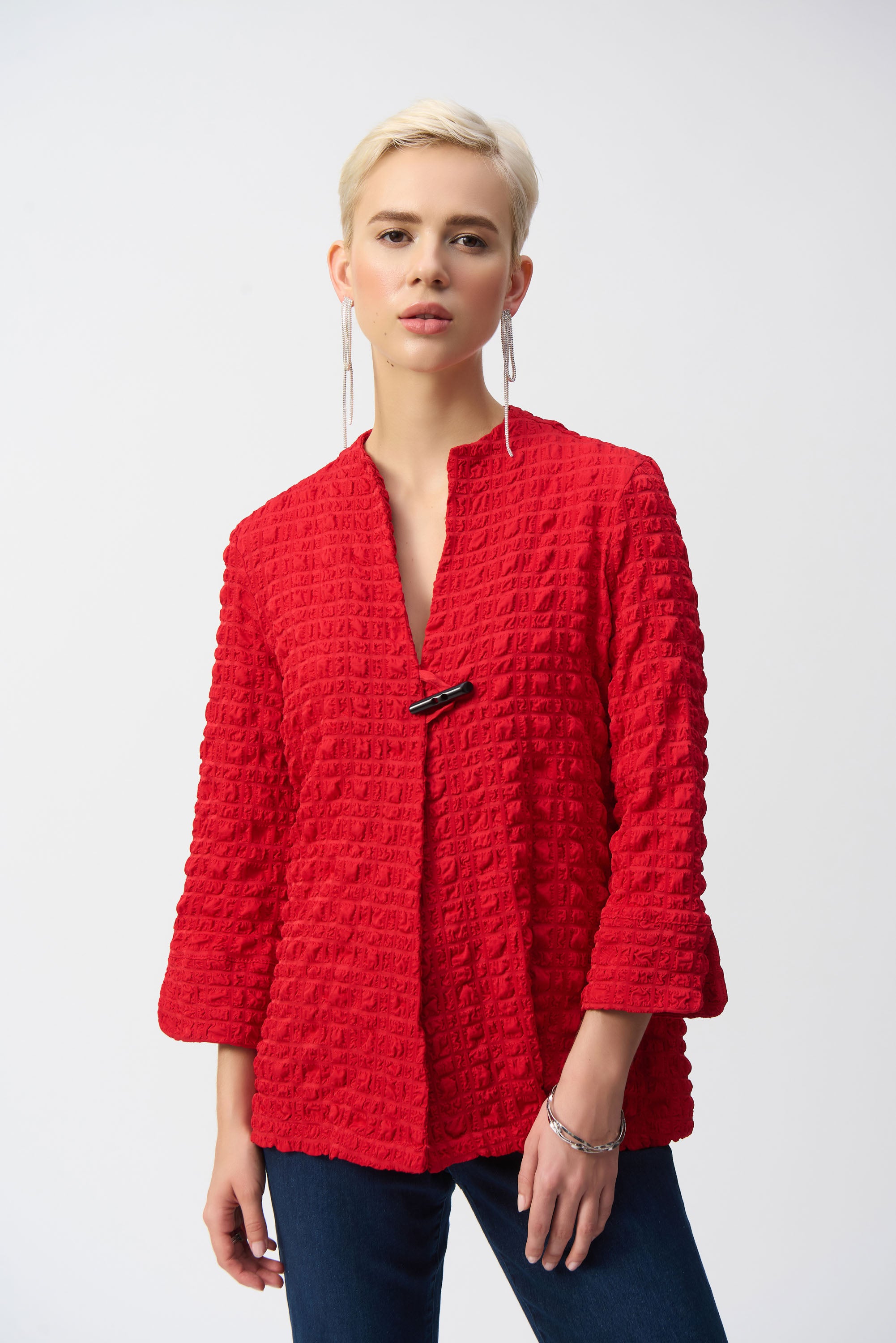 Pearls Boutique- Port Dover Ontario-Joseph Ribkoff Textured Jacket- 251034-Red, Spring 2025 Collection, made in Canada, chic textured finish, sleek closure detail, 3/4 length sleeves, A-line silhouette, relaxed fit through bodice, premium stretch fabric, vibrant colour options, sophisticated and stylish layering piece.







