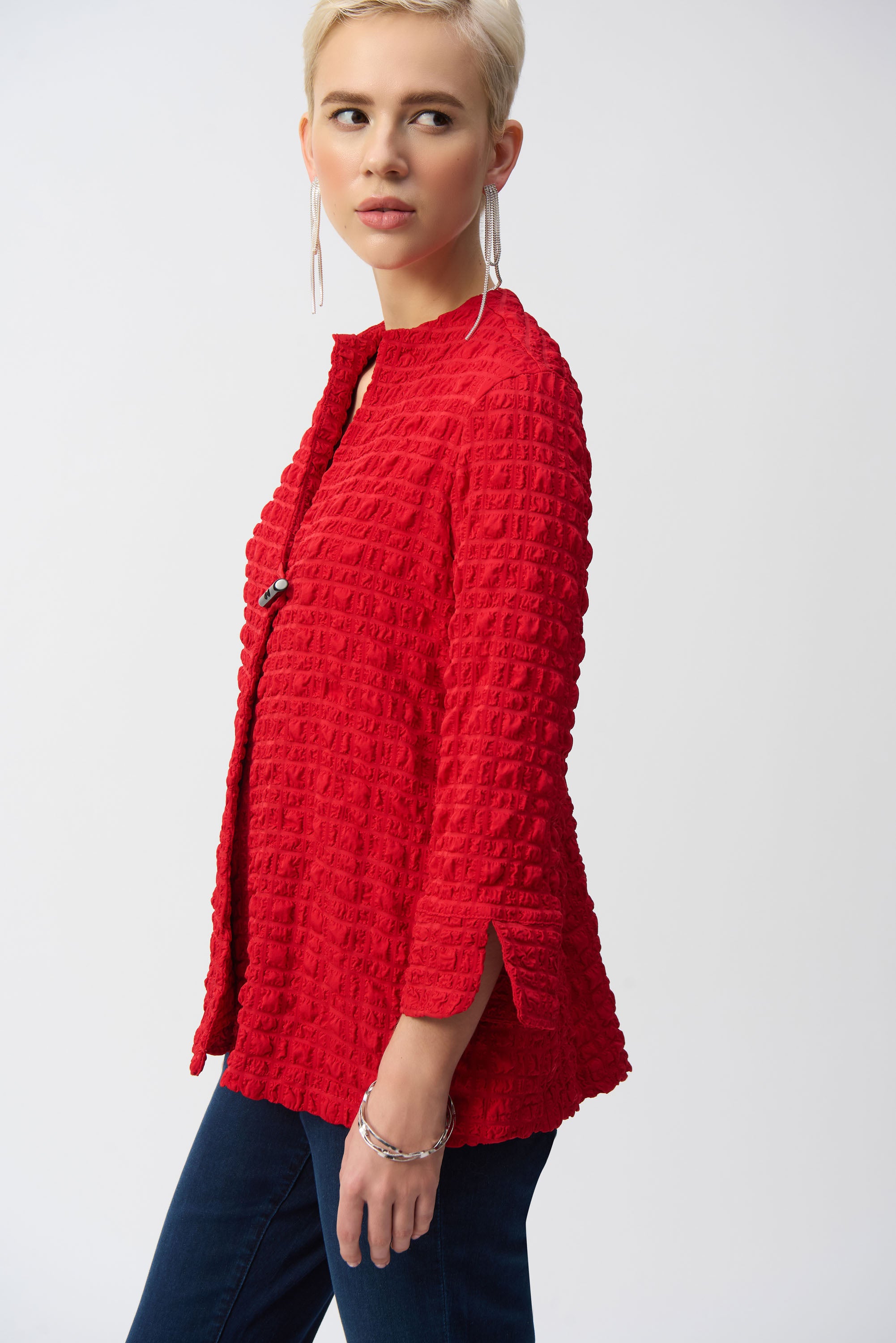 Pearls Boutique- Port Dover Ontario-Joseph Ribkoff Textured Jacket- 251034-Red, Spring 2025 Collection, made in Canada, chic textured finish, sleek closure detail, 3/4 length sleeves, A-line silhouette, relaxed fit through bodice, premium stretch fabric, vibrant colour options, sophisticated and stylish layering piece.







