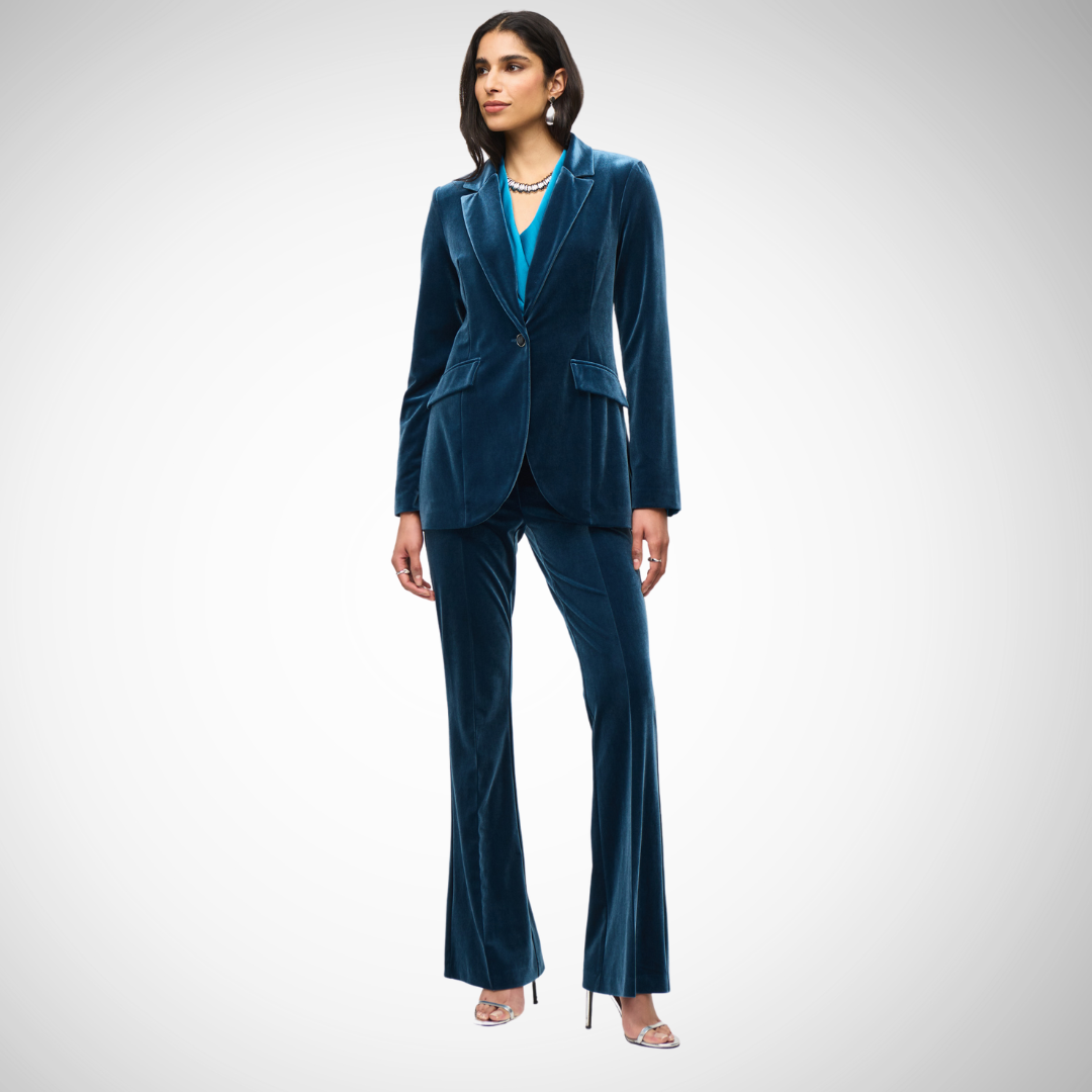 Pearls Boutique - Port Dover Ontario - Joseph Ribkoff Velvet Blazer - Teal, single breasted, button closure, knotched Lapel collar, Experience pure luxury with the Joseph Ribkoff Velvet Blazer! This blazer from Joseph Ribkoff boasts a fancy notched collar, comfy regular fit, and stylish buttons that add a touch of class. The subtle pattern and single-breasted closure keep it sleek and sophisticated. Made with 98% Polyester and 2% Spandex.