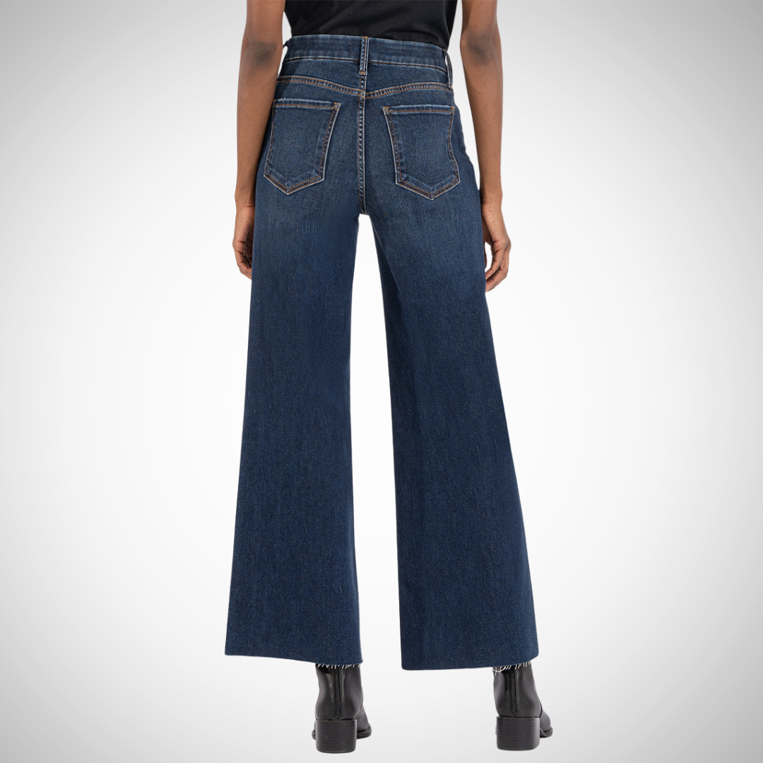 Pearls Boutique - Port Dover Ontario - KUT - Meg Fab Ab Wide Leg. Style: High-rise, wide-leg jeans Design: Classic 5-pocket styling, Fly front Fabric: 87% cotton, 12% polyester, 1% spandex Fit: Comfortable, flattering with Fab Ab front pockets Details: Raw hems for a trendy touch Measurements: 27" inseam, 23" leg opening, 10 1/2" rise Fit: Runs slightly oversized Color: Vintage-inspired "Exhibited Wash"