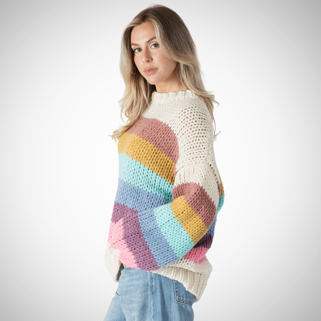 The Shania sweater is a fun mix of colour and whimsical.  an oat coloured base is offset by multi coloured stripes  balloon sleeve&nbsp;  drop shoulder  crew neckline&nbsp;  relaxed fit&nbsp;  100% Polyester&nbsp;  Perfect for cozying up on cool Autumn mornings