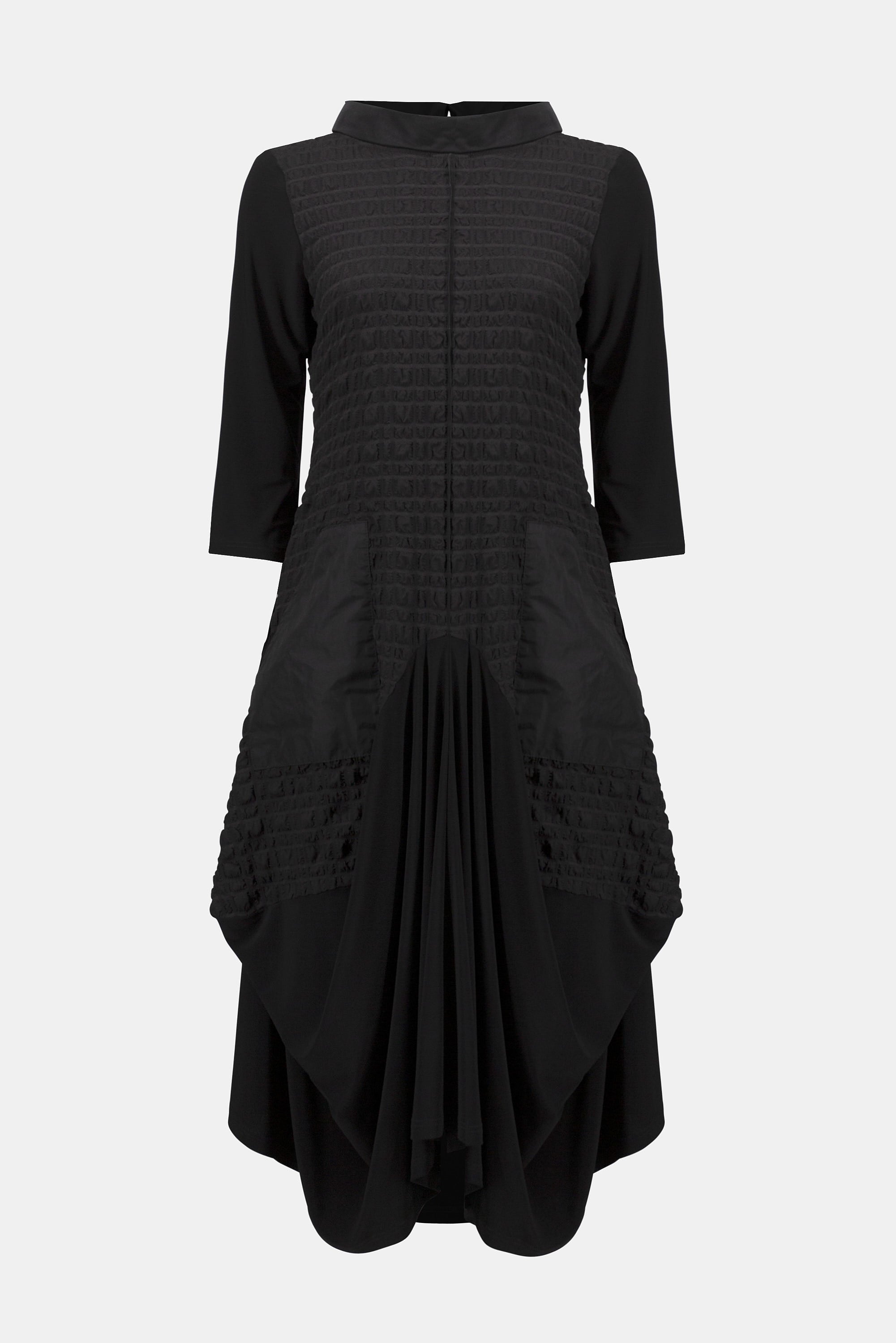 Pearls Boutique| Port Dover Ontario |Joseph Ribkoff | Bubble Jacquard  Silky Knit Cocoon Dress| colour black.
A-line silhouette with a fluid, graceful drape that flatters every movement
Silky knit base with luxe bubble jacquard and memory fabric accents for sculptural texture
Soft cowl neckline adds a touch of understated drama
Three-quarter sleeves designed to balance structure with effortless ease
Functional front pockets for a blend of chic style and everyday practicality
Back zipper closure