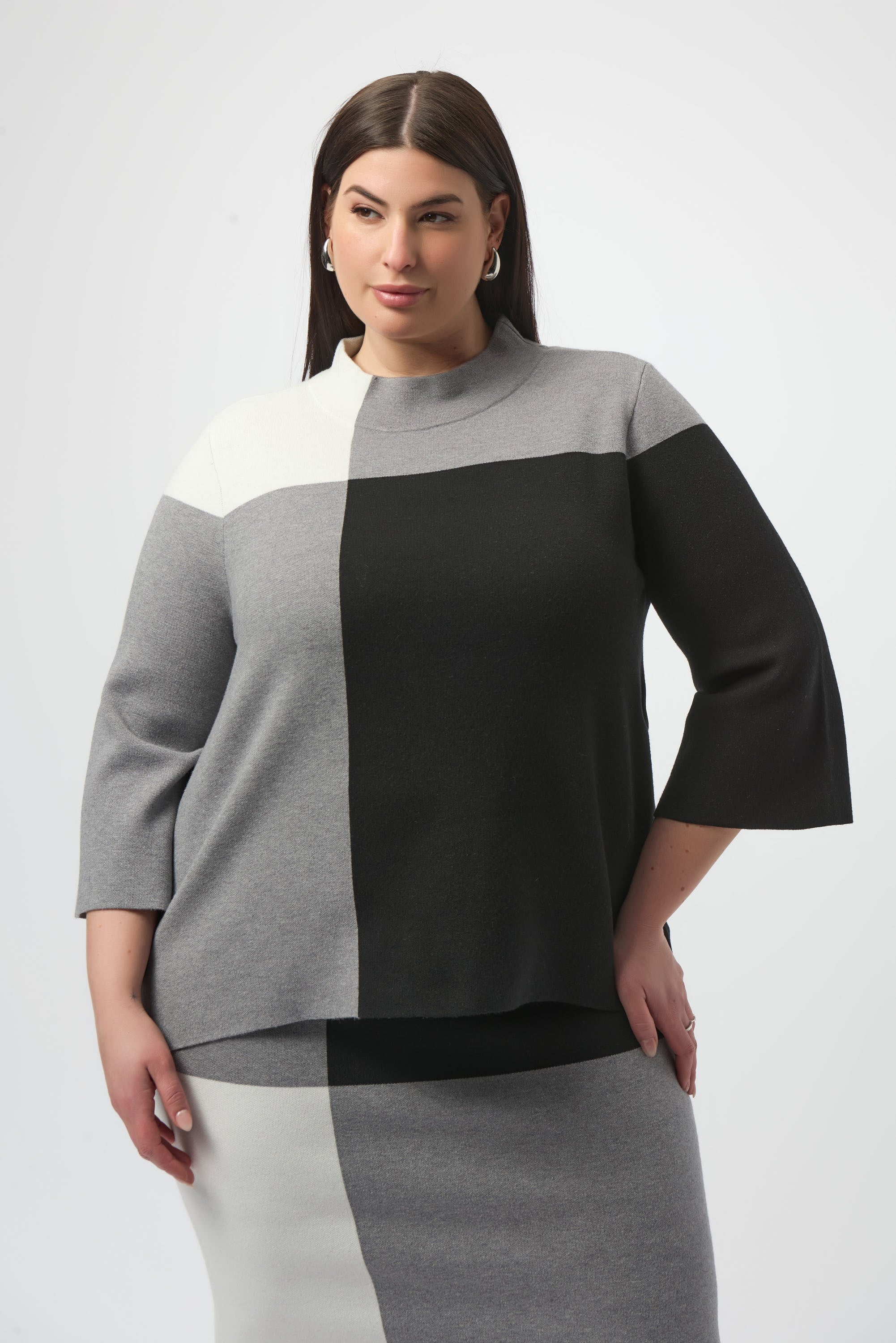 Pearls Boutique | Port Dover Ontario | Joseph Ribkoff Jacquard Sweater | Colour Block Pullover | colour Black/white/grey.
Soft jacquard sweater knit with rich texture and drape
Statement colour-block print for a modern, artistic edge
Classic crew neckline for timeless appeal
Three-quarter straight sleeves for an elegant, everyday fit